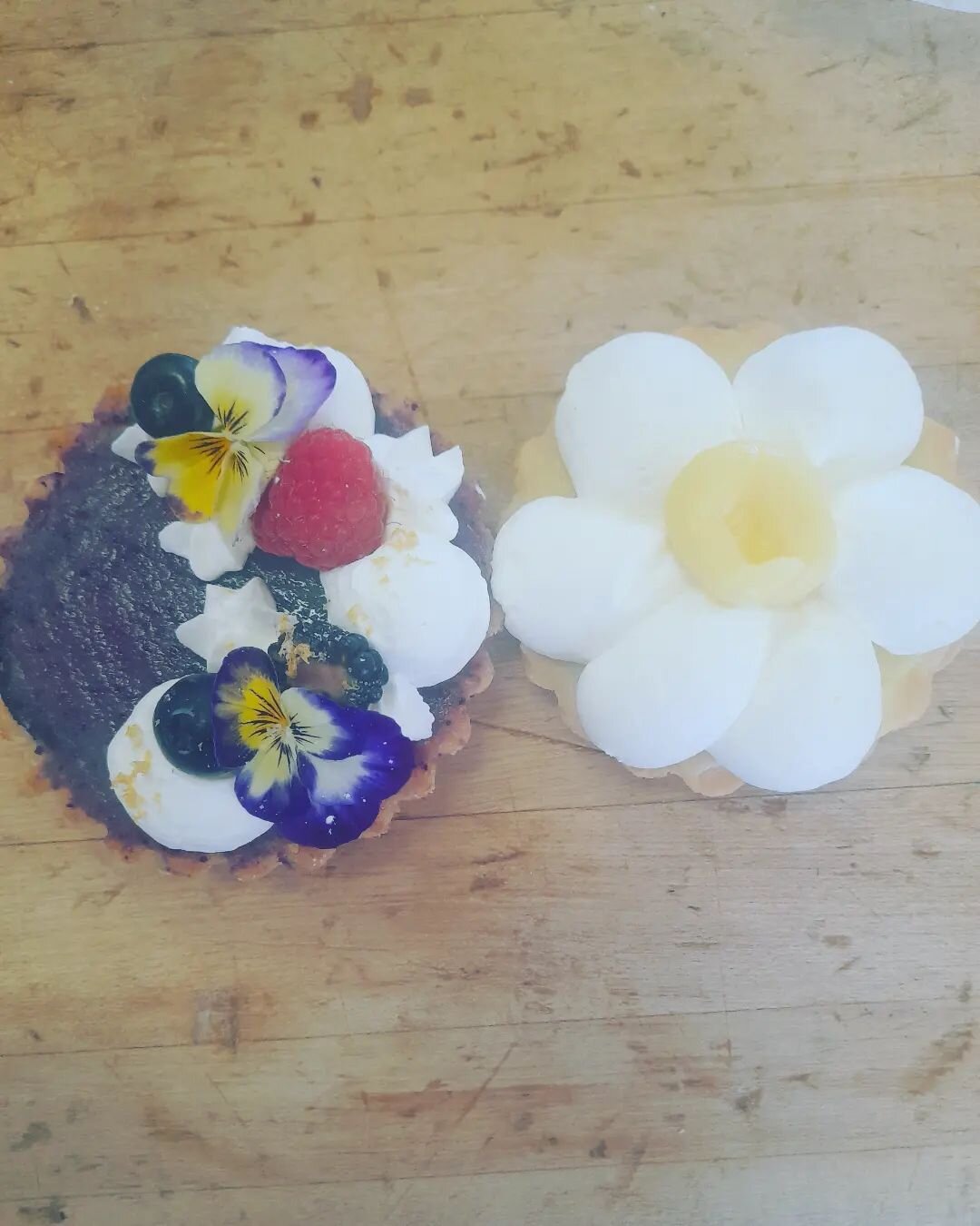 Good morning! 
We have two new tarts to add to our collection!
Mixed berry frangipan tart- frangipan topped off with a Mixed berry custard, whipped cream, fresh fruit and edible flowers!
Summer citrus tart- lemon and orange custard topped off with fr