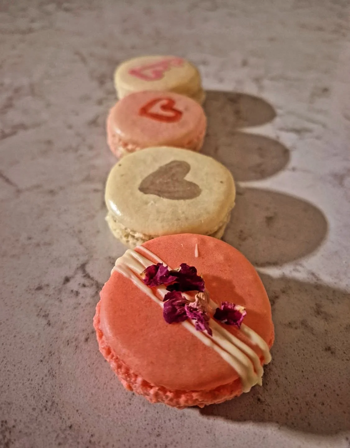 Meet the treat: macaron [ MAK &bull; A&bull; RHON] 
Our macarons are made from scratch with chocolate based fillings! Crispy on the outside with a smooth filling! Flavours are rotated  based on seasons and holidays! 
We'd love to hear what your favor