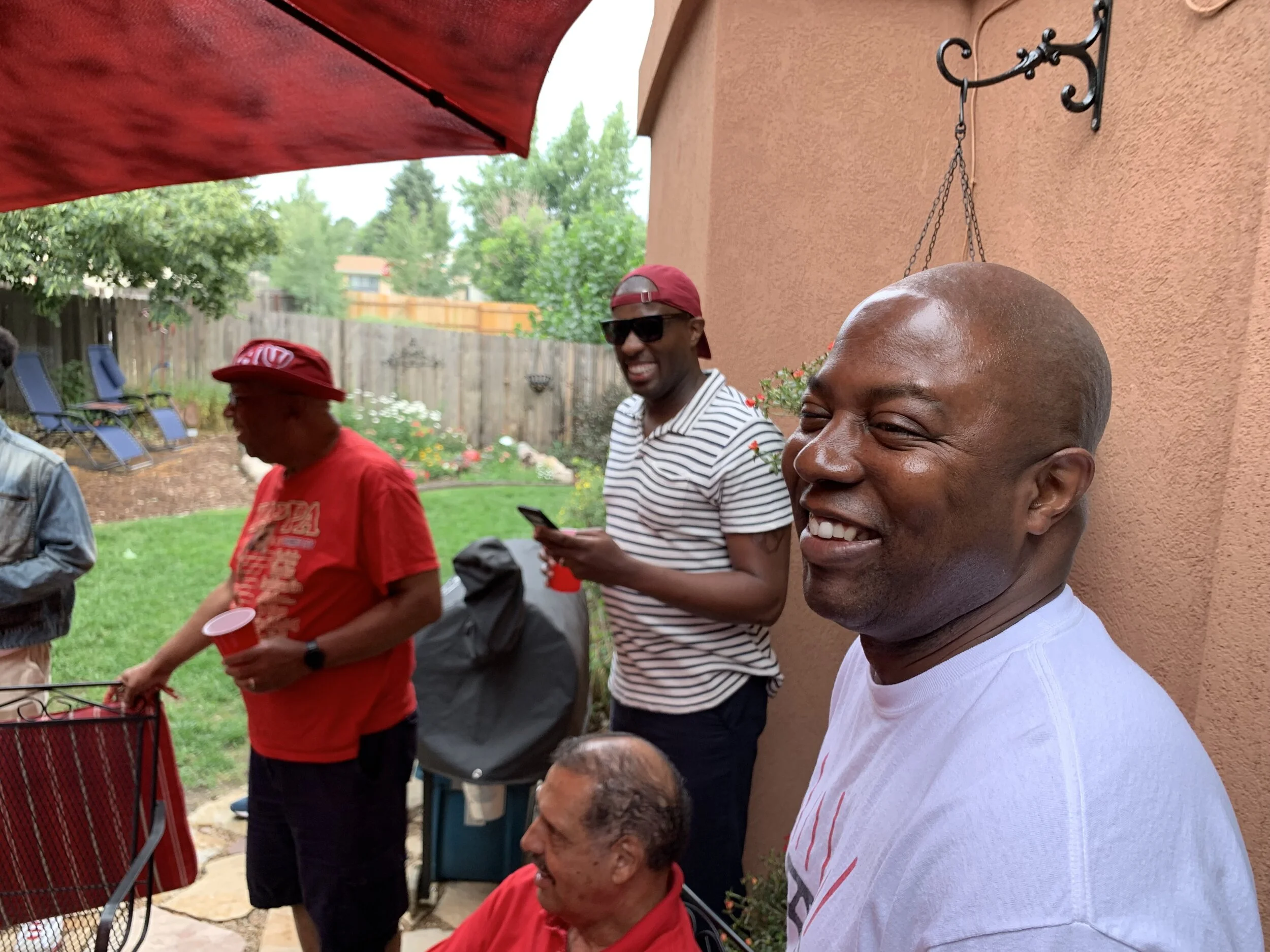Senior Kappa brother smiling during fellowship