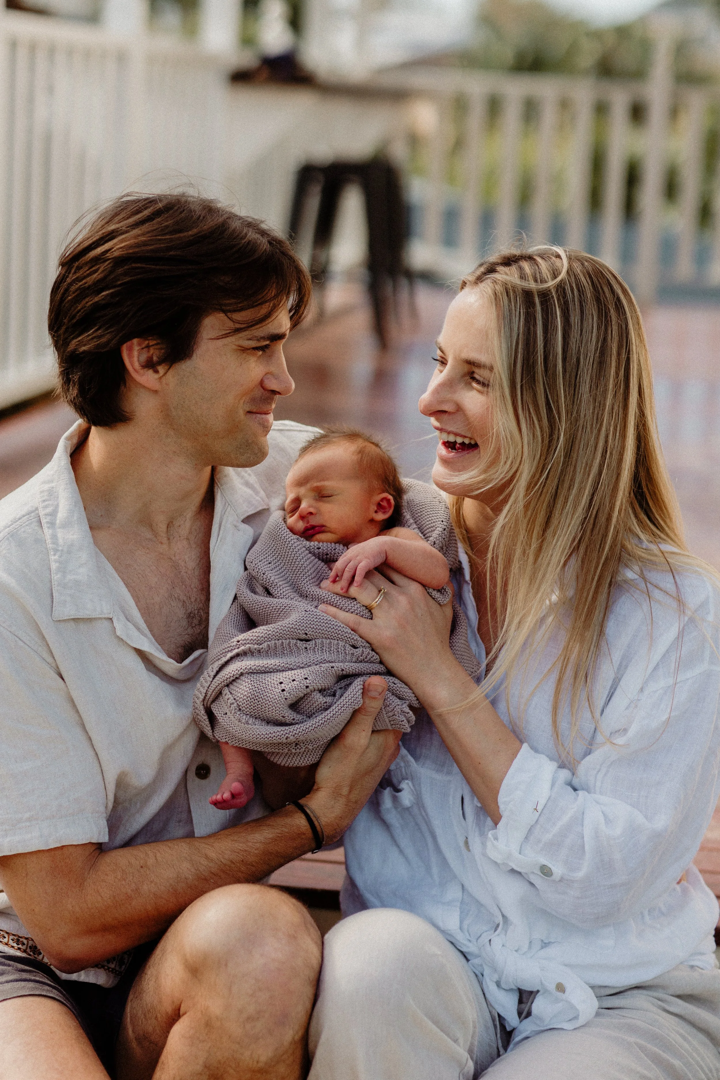 happy smiling newborn family