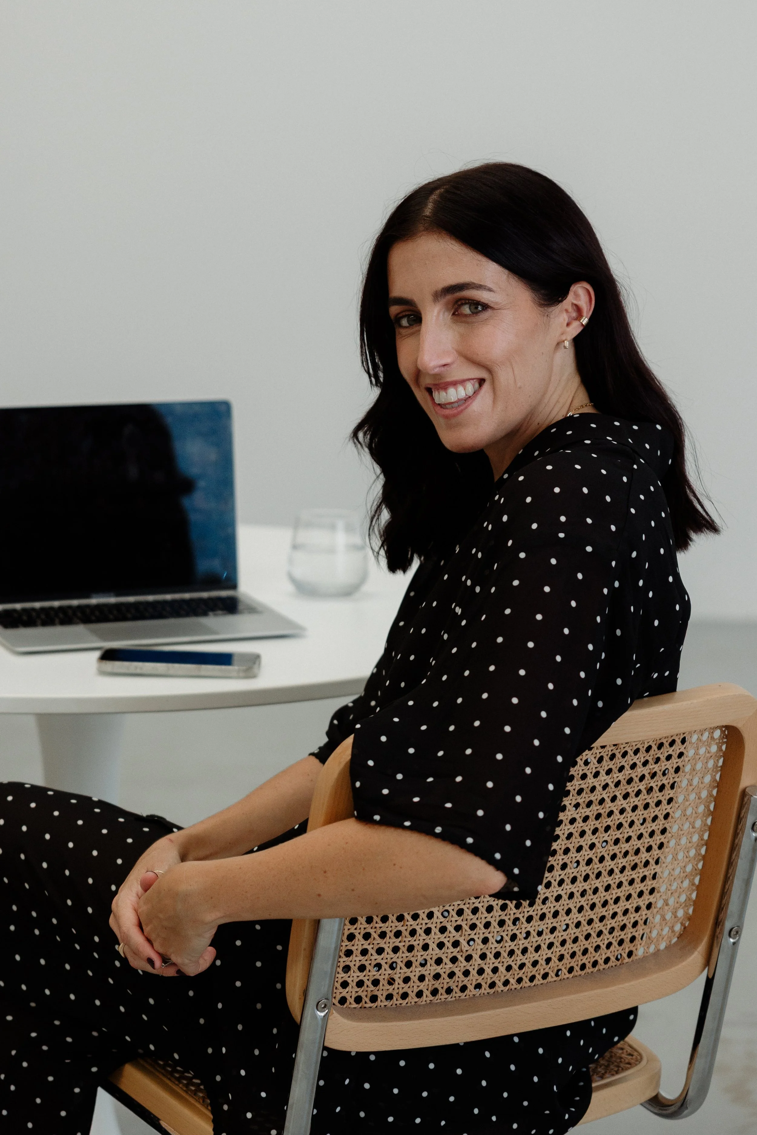 boss lady at computer photoshoot