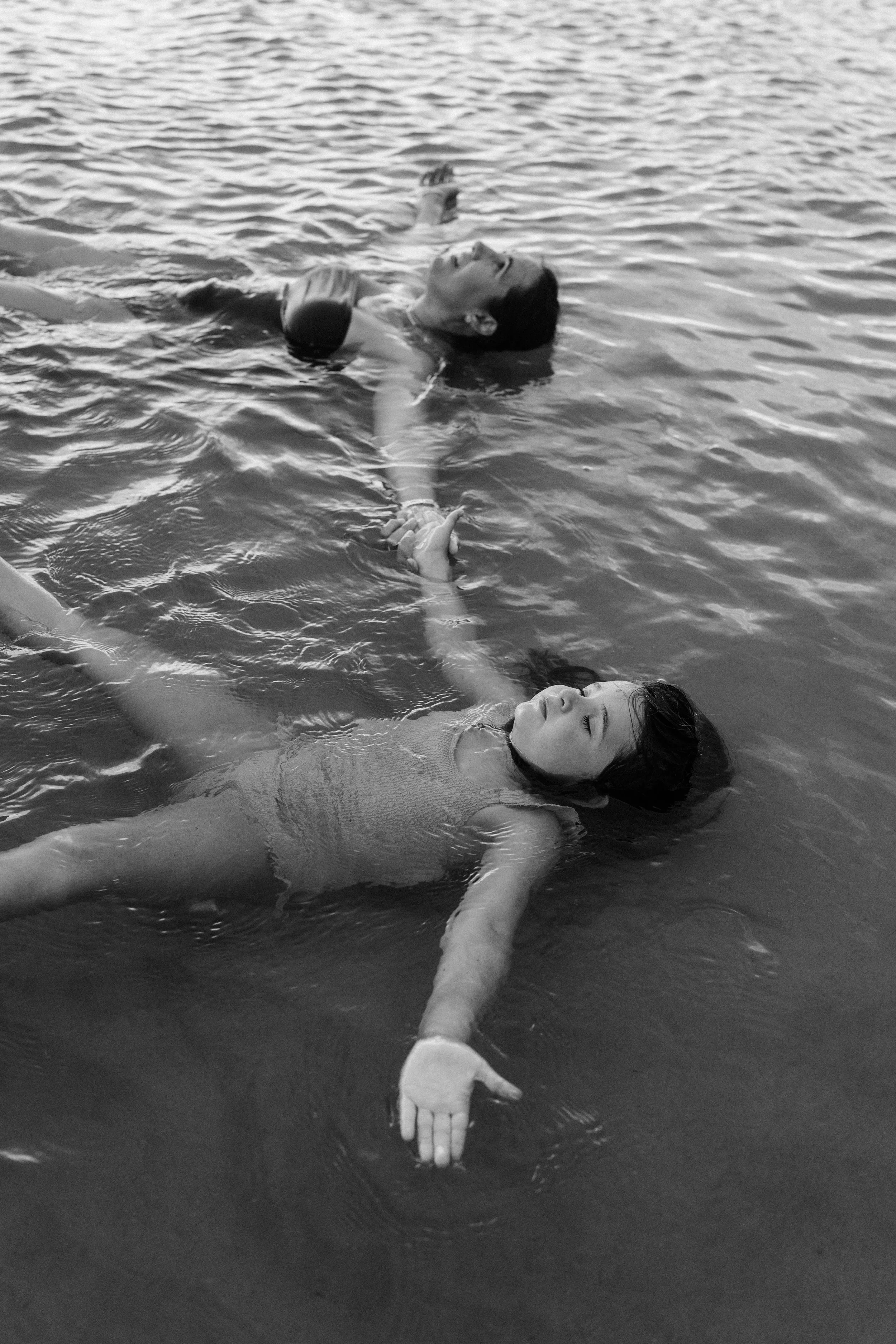 family floating in the water