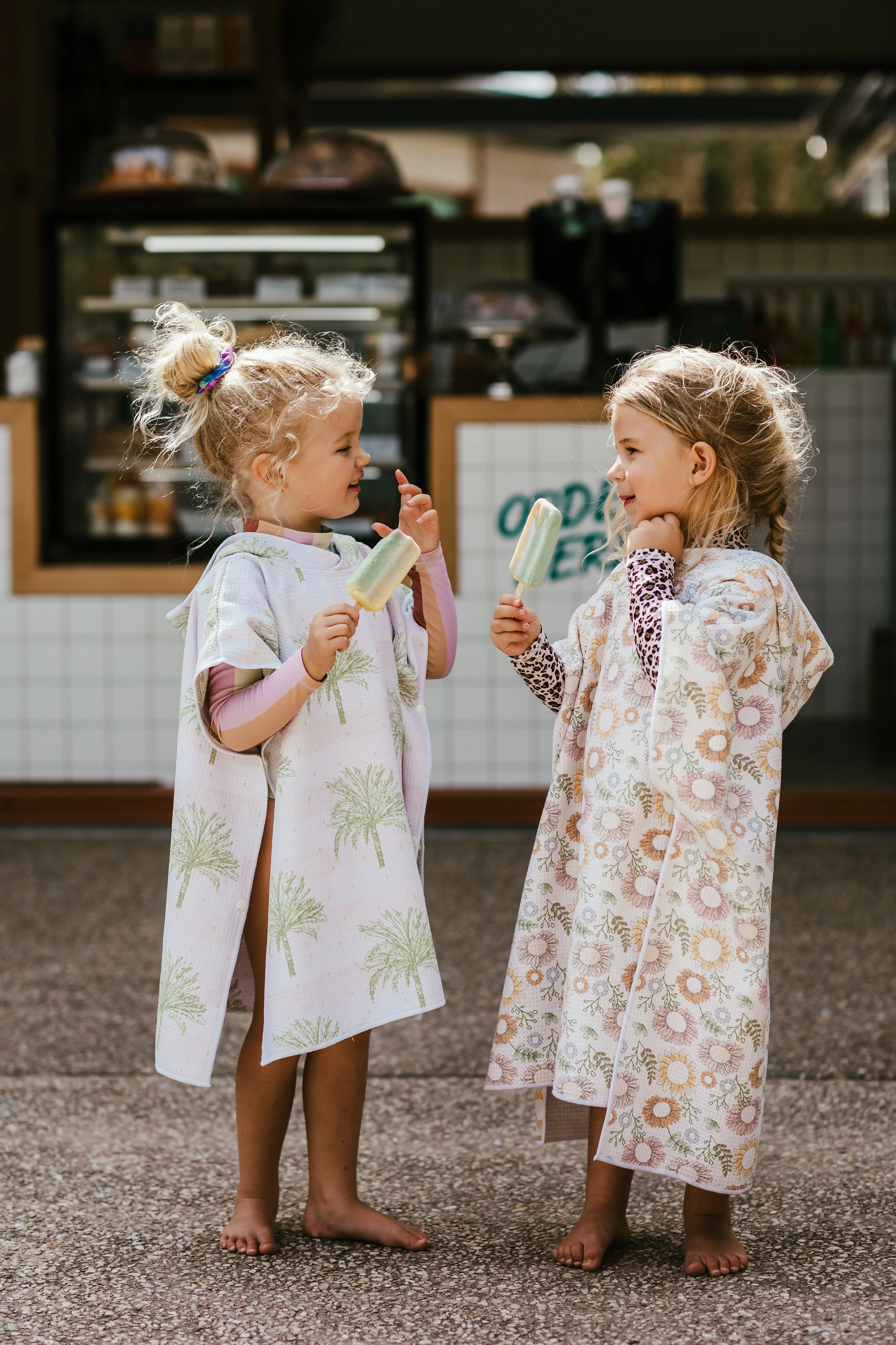 commercial branding photoshoot kids in towel eating ice cream