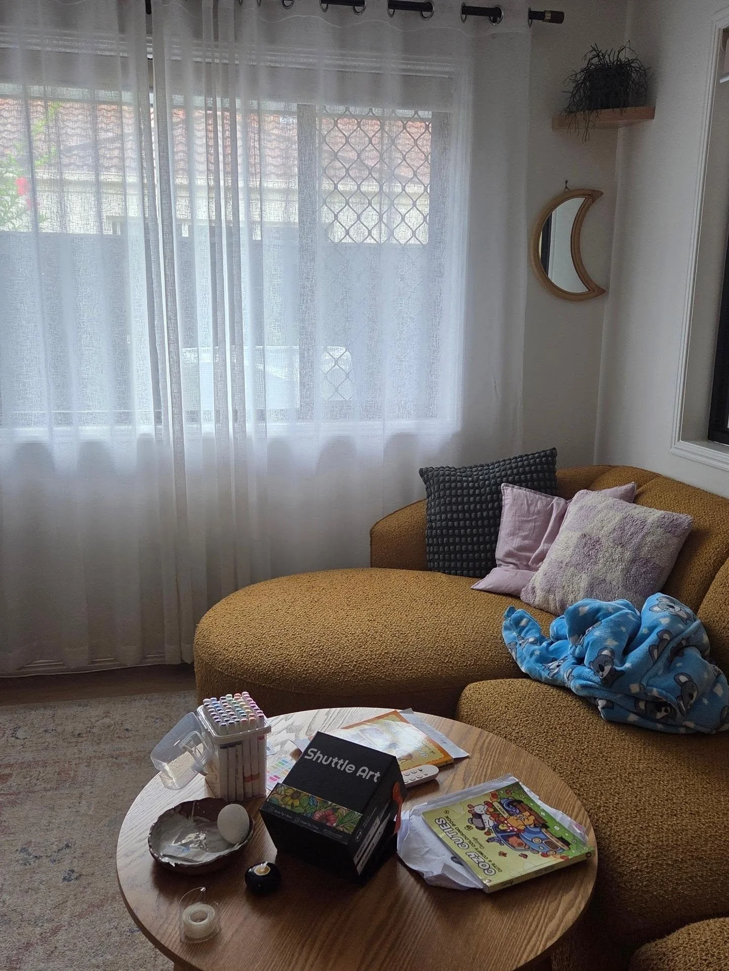 yellow lounge room with sheer curtain family photoshoot