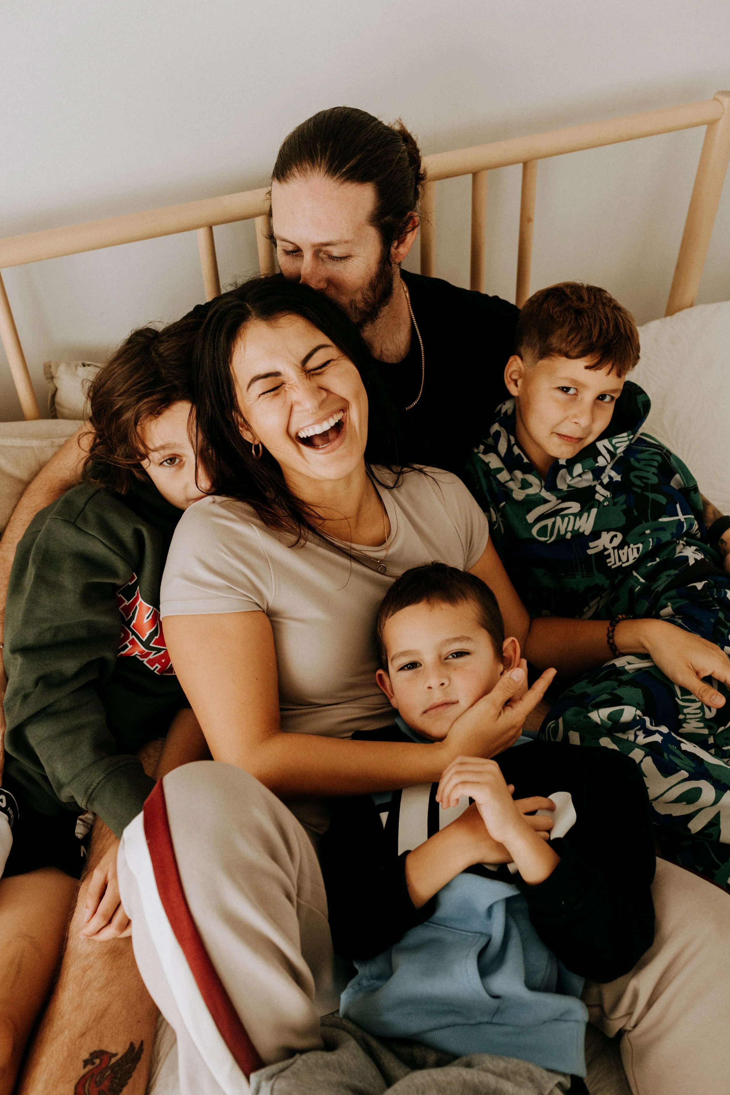 family hanging out laughing at home