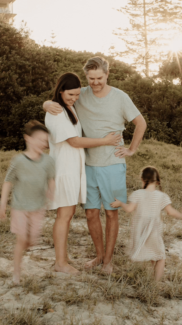 kids run circles around mum and dad gold coast photos