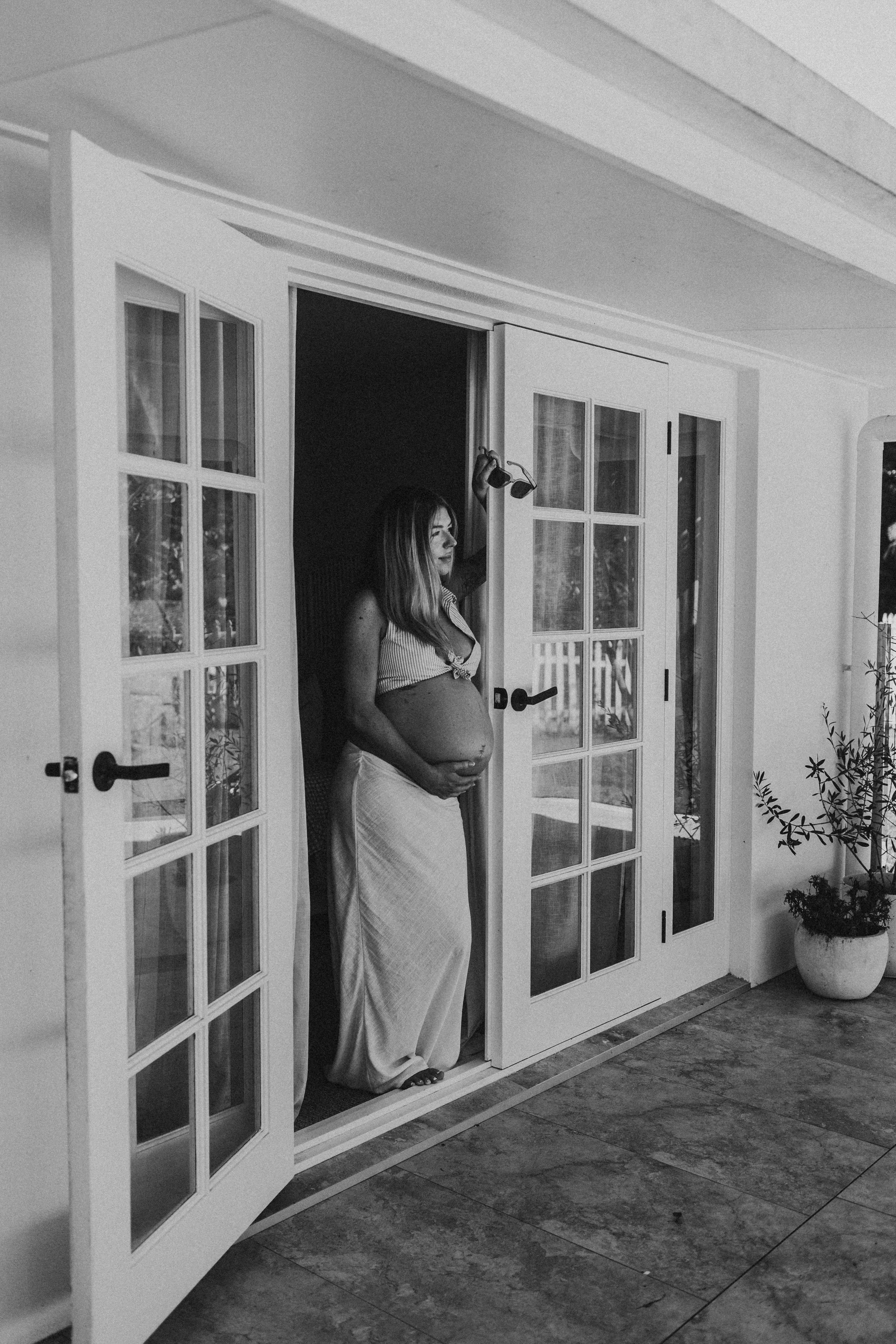 pregnancy girl in doorway