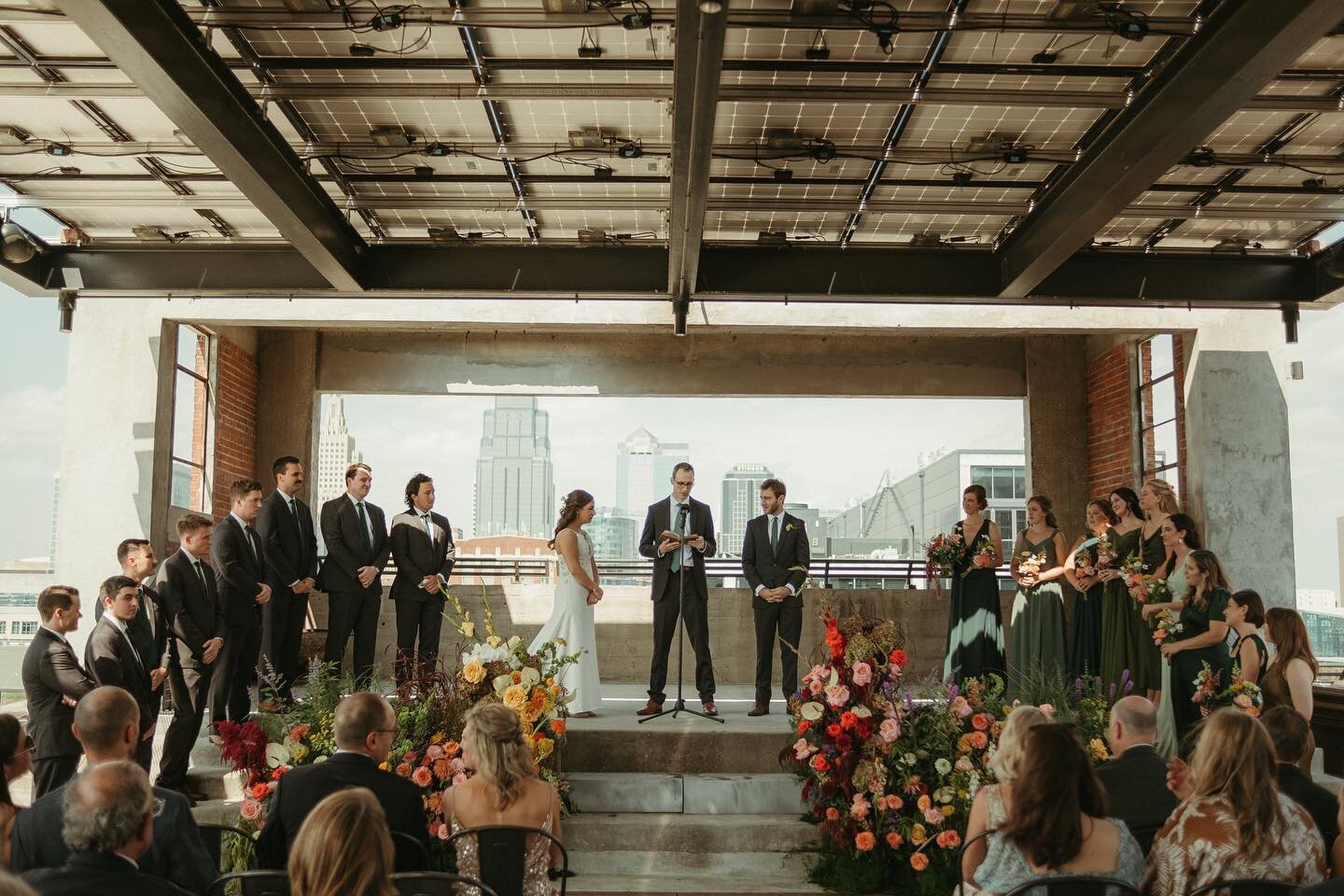 Erica &amp; Colin&rsquo;s rooftop ceremony and reception at Corrigan Station was one for the books!! Want to see this rooftop in action? Join us Thursday, 6/8 for our Open House. Link in bio!

@confettievents_kc
@nickallenphoto
@floraloom
@pbjcaterin