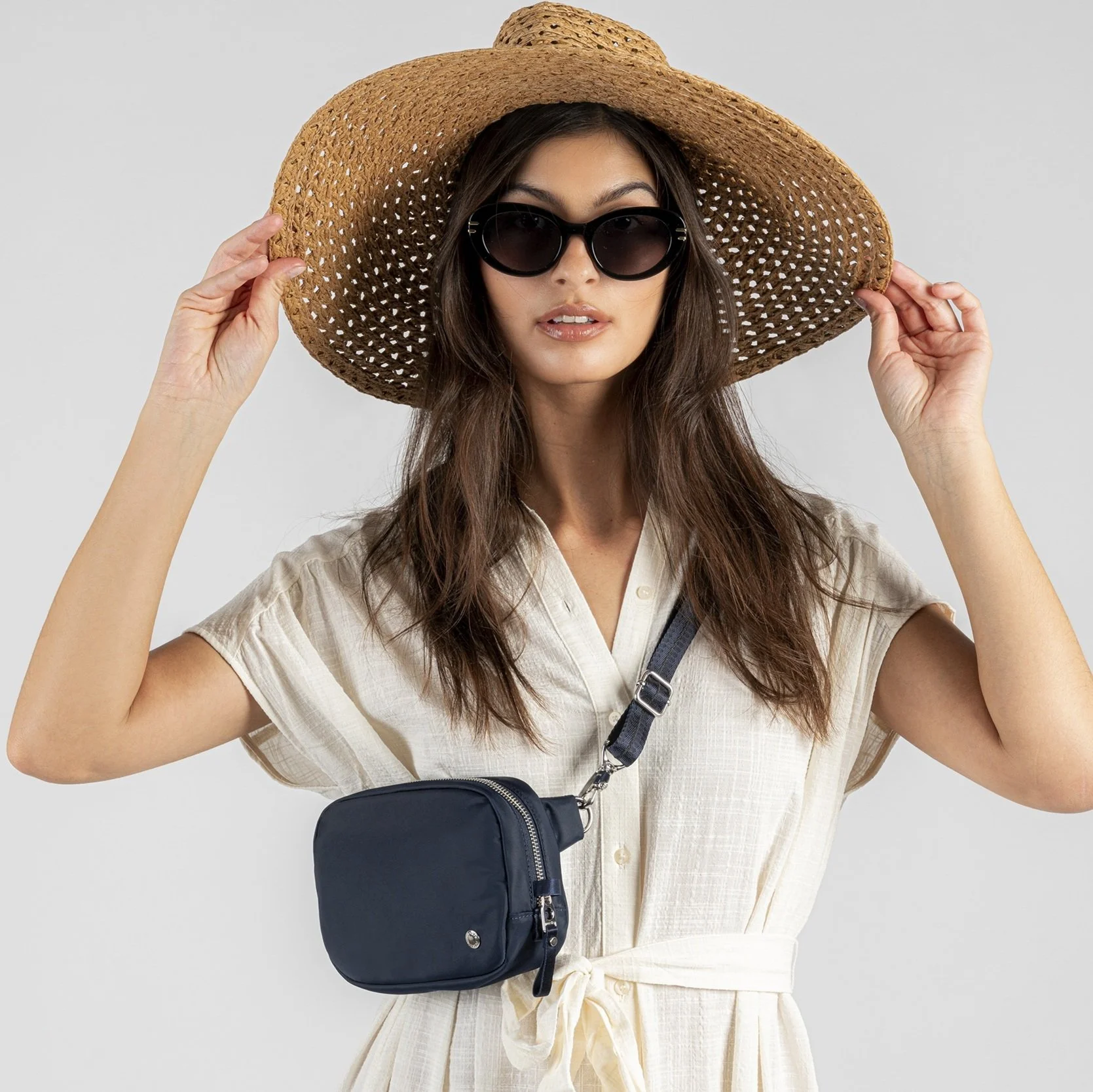 PacsafeW_MicroSling_20467606_Navy_1a.jpg (Copy) (Copy)