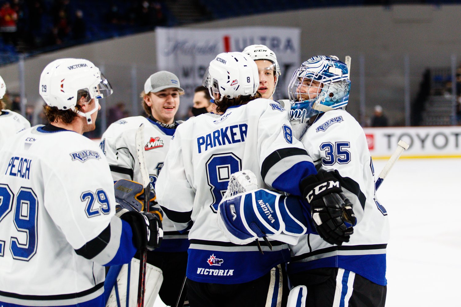 Campbell Arnold, Kalem Parker, Gannon Laroque, Tyler Palmer, and Bailey Peach celebrate a Victoria Royals win