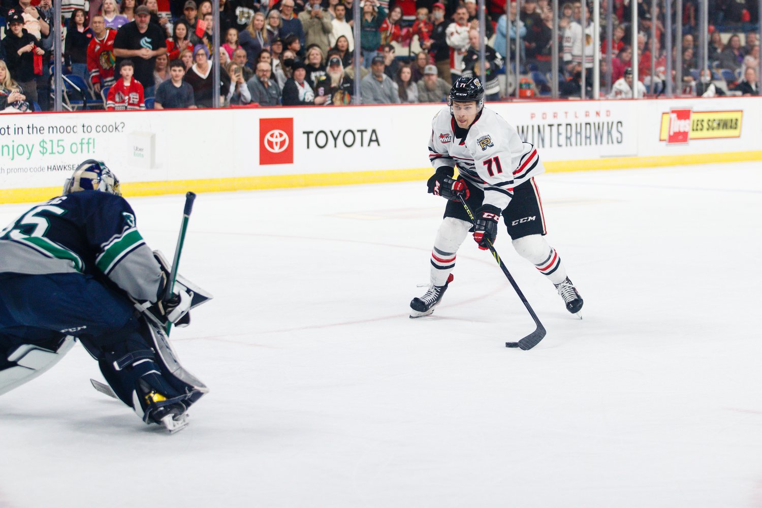 Cross Hanas takes a penalty shot attempt on Seattle Thunderbirds goaltender Thomas Milic