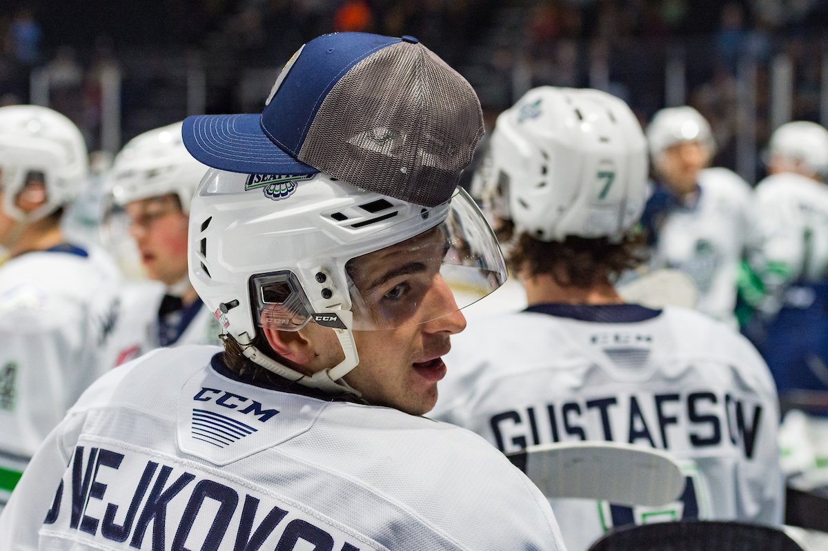 Lukas Svejkovsky of the Seattle Thunderbirds with a hat on top of his helmet