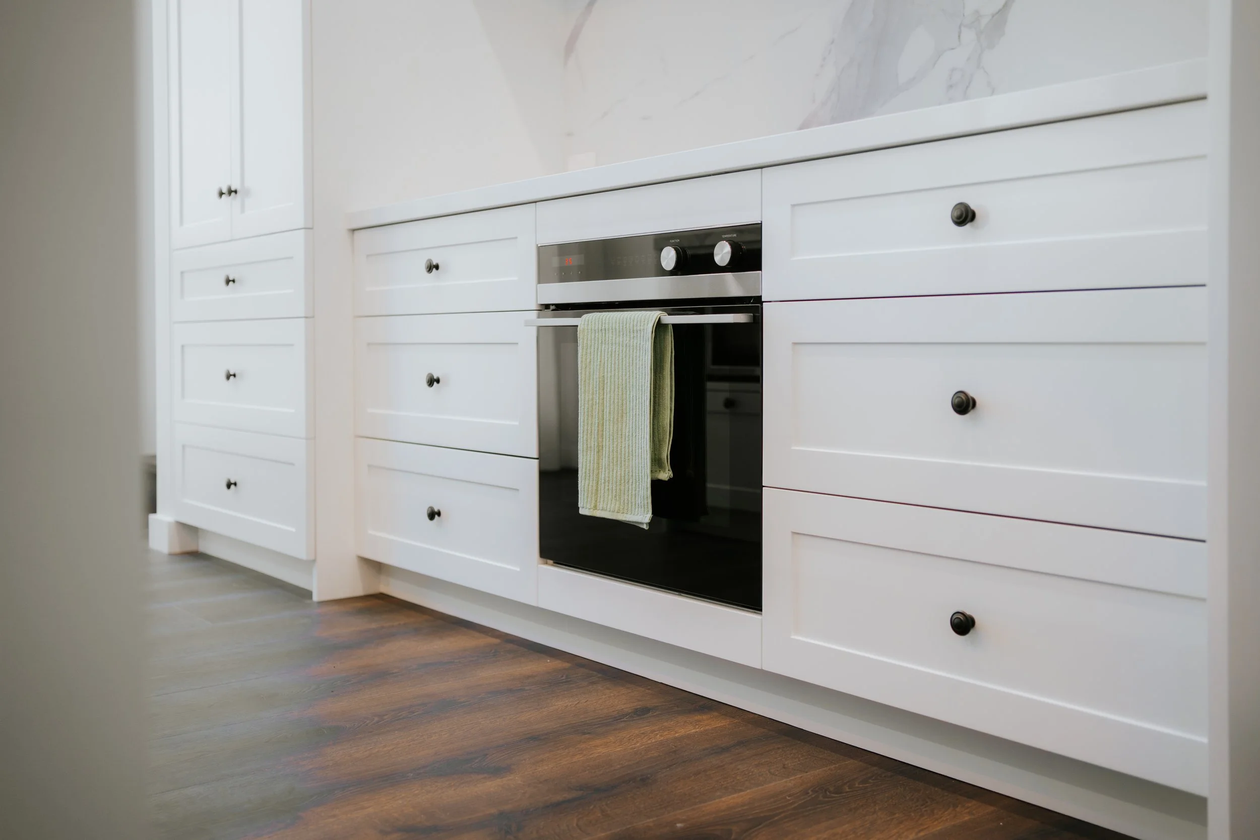 Custom joinery and modern kitchen design in Cronulla duplex residence