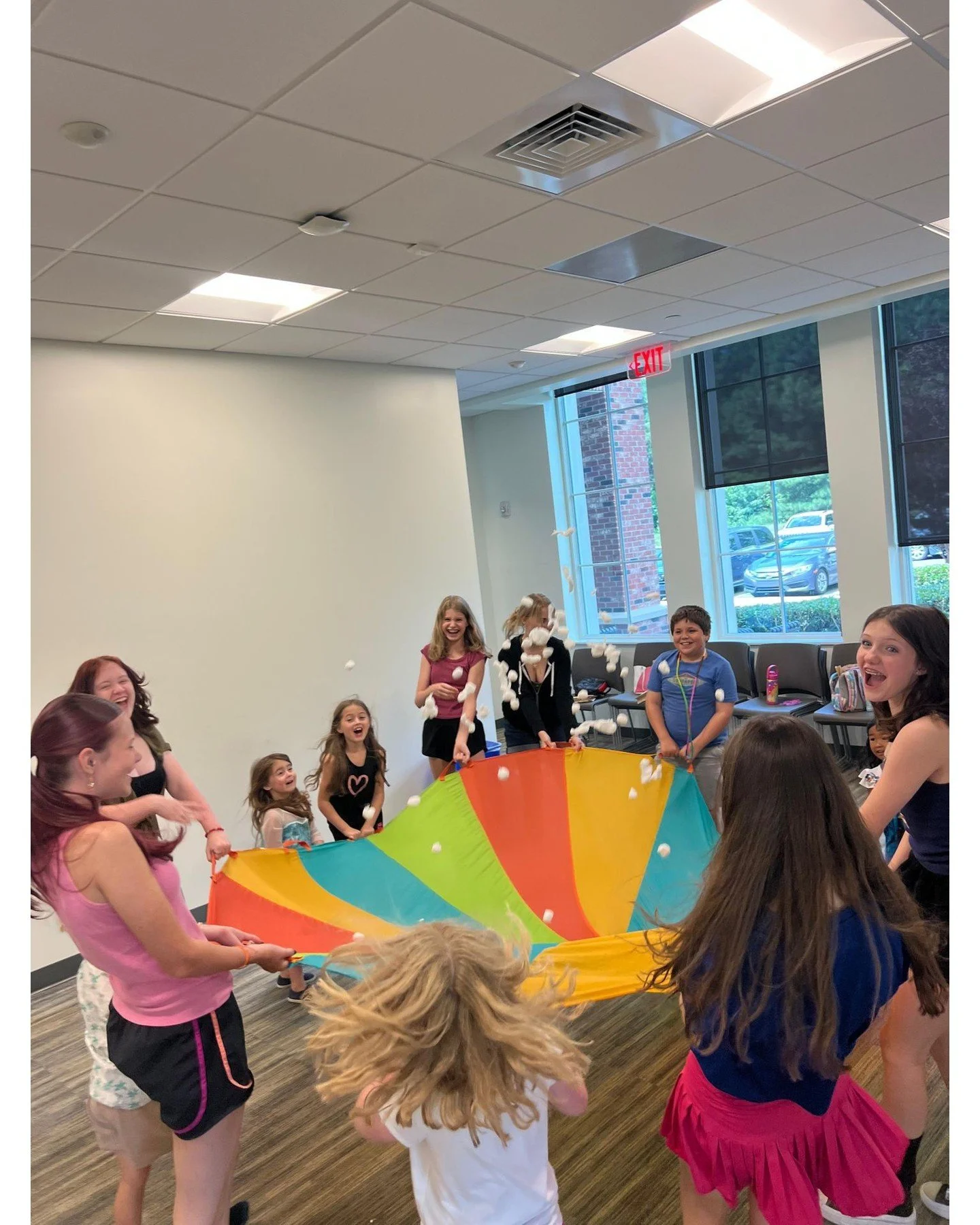 Summer memories around the parachute are priceless! We use our parachutes for so many things over the summer including learning simple music theory concepts, team building, imaginative play, acting games, and so much more! We hope you'll join us arou