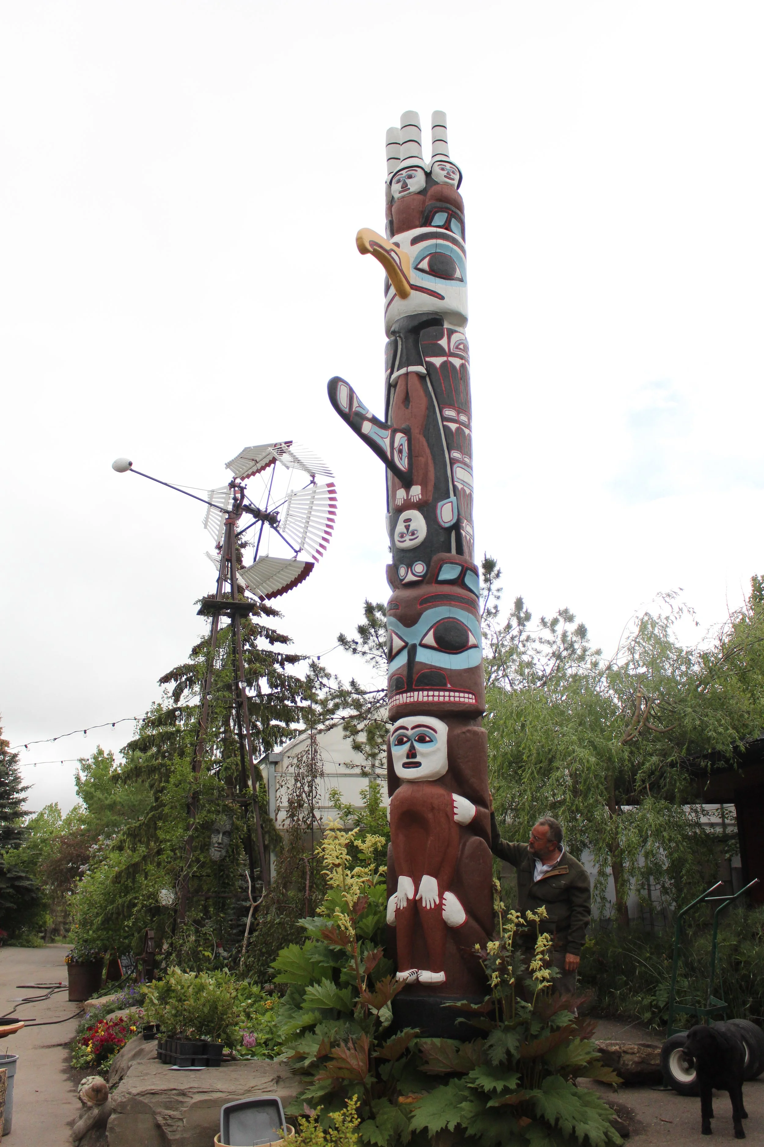 Hand carved totem pole rescued and repainted by the Saskatoon Farm. Appreciation for traditional arts and first peoples culture.