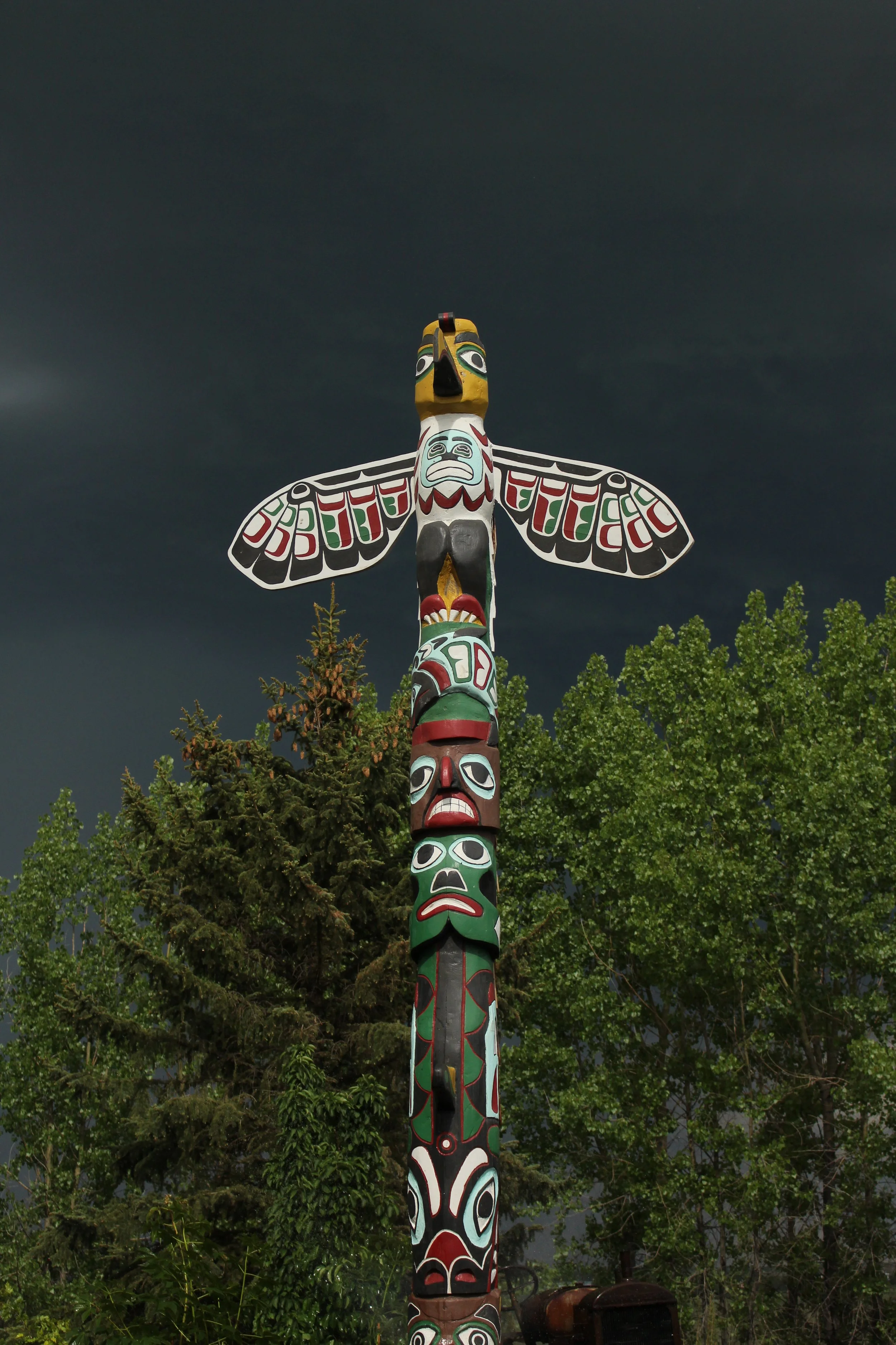 Hand carved totem pole rescued and repainted by the Saskatoon Farm. Appreciation for traditional arts and first peoples culture.