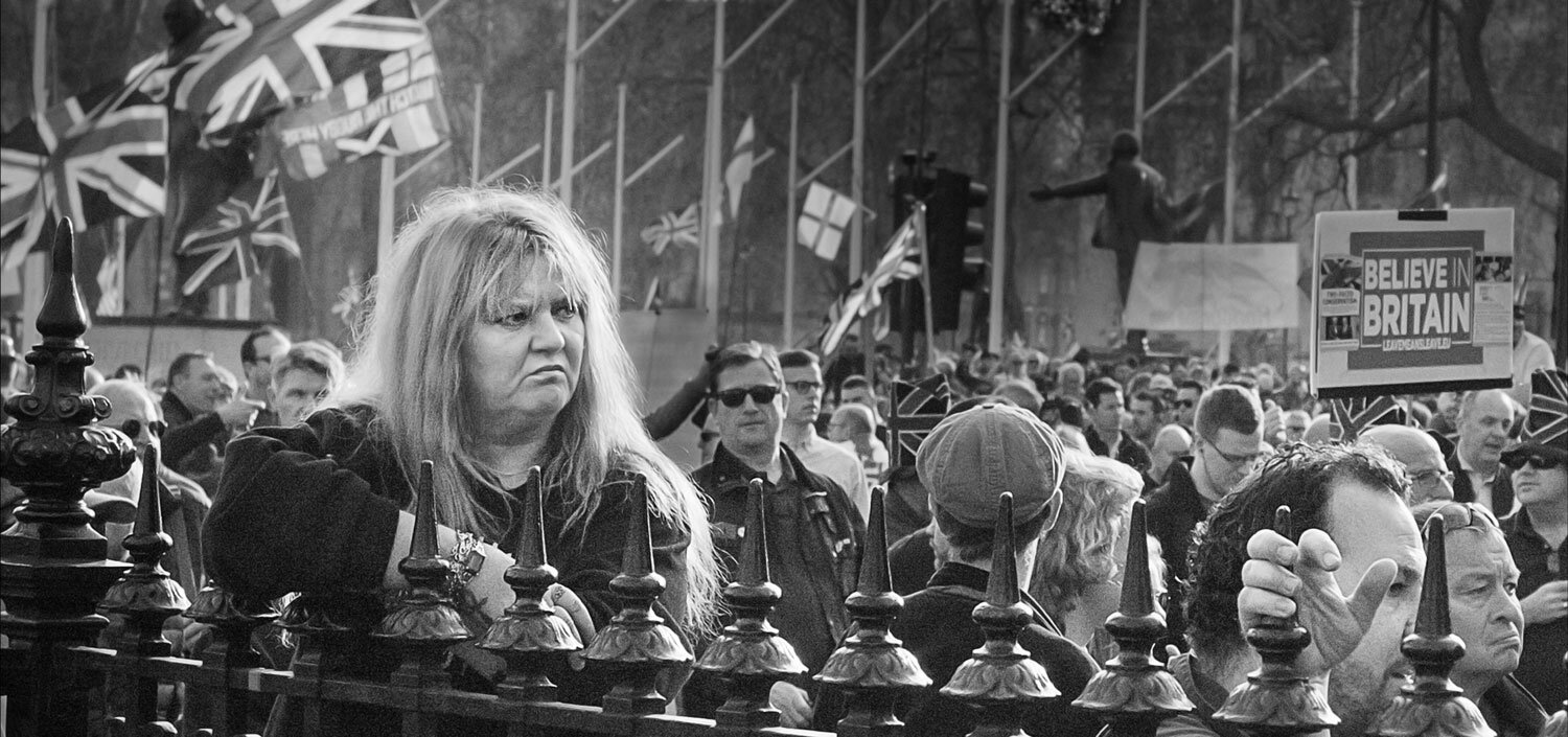 woman-watching-protest.jpg