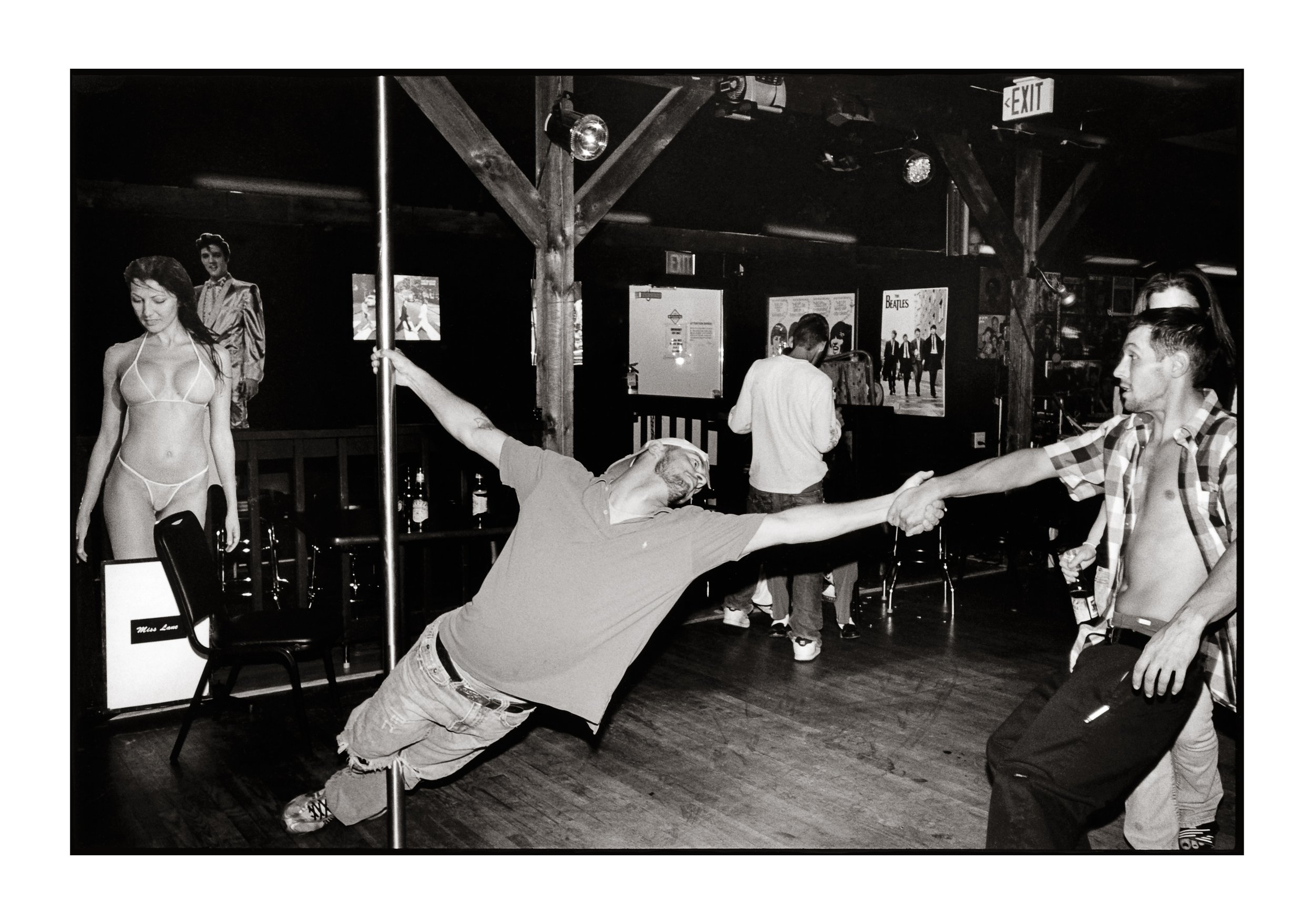 Melonie Bennett, Travis and Chippa, Stripper Pole at Memory Lane Music Hall, 1/10, 2010, Inkjet Print, 24 x 33 inches, $1,750