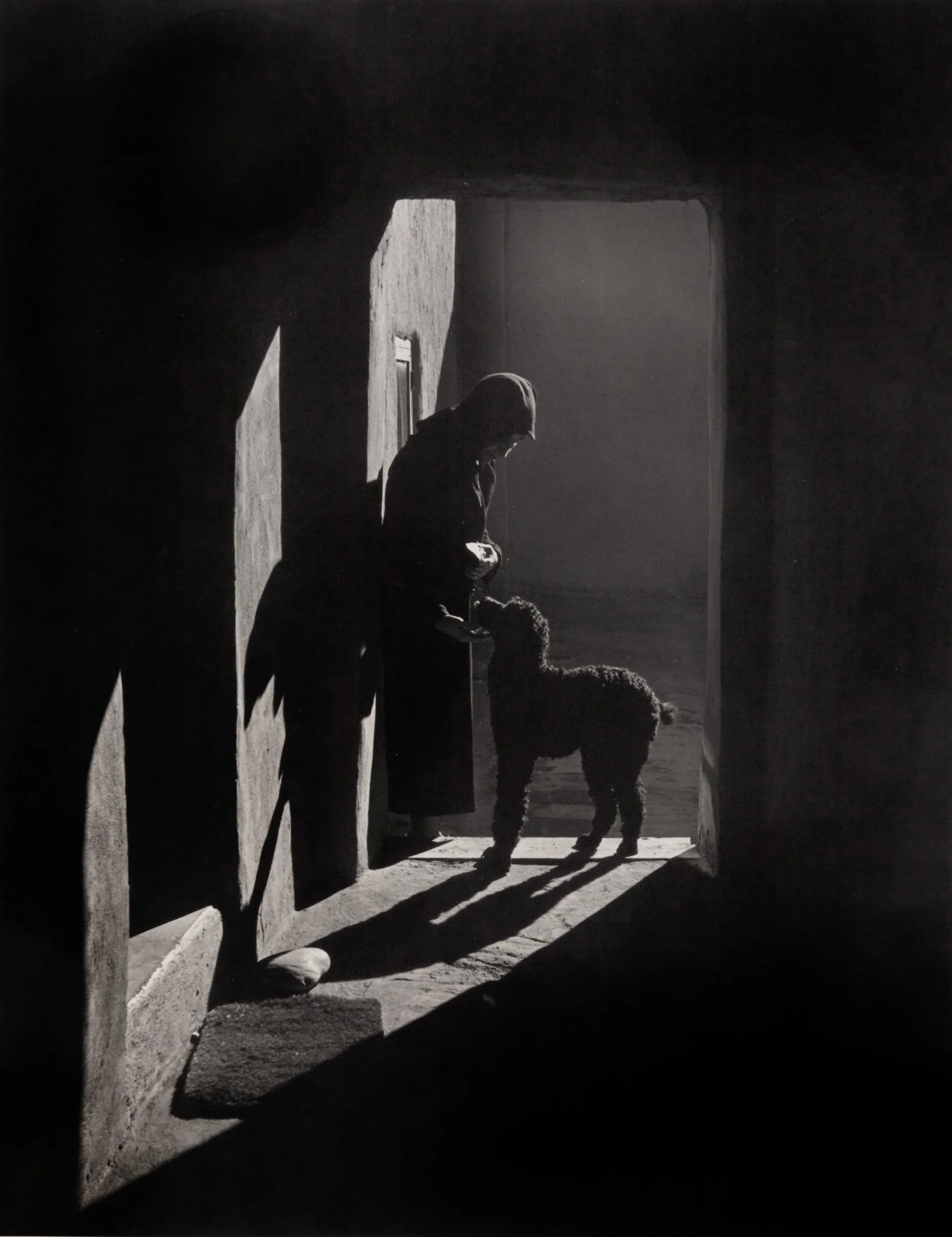 George Daniell, Georgia O'Keeffe with Pancho, Abiquiu Patio, 1952, Silver print, 10 x 8 inches, $1,500.