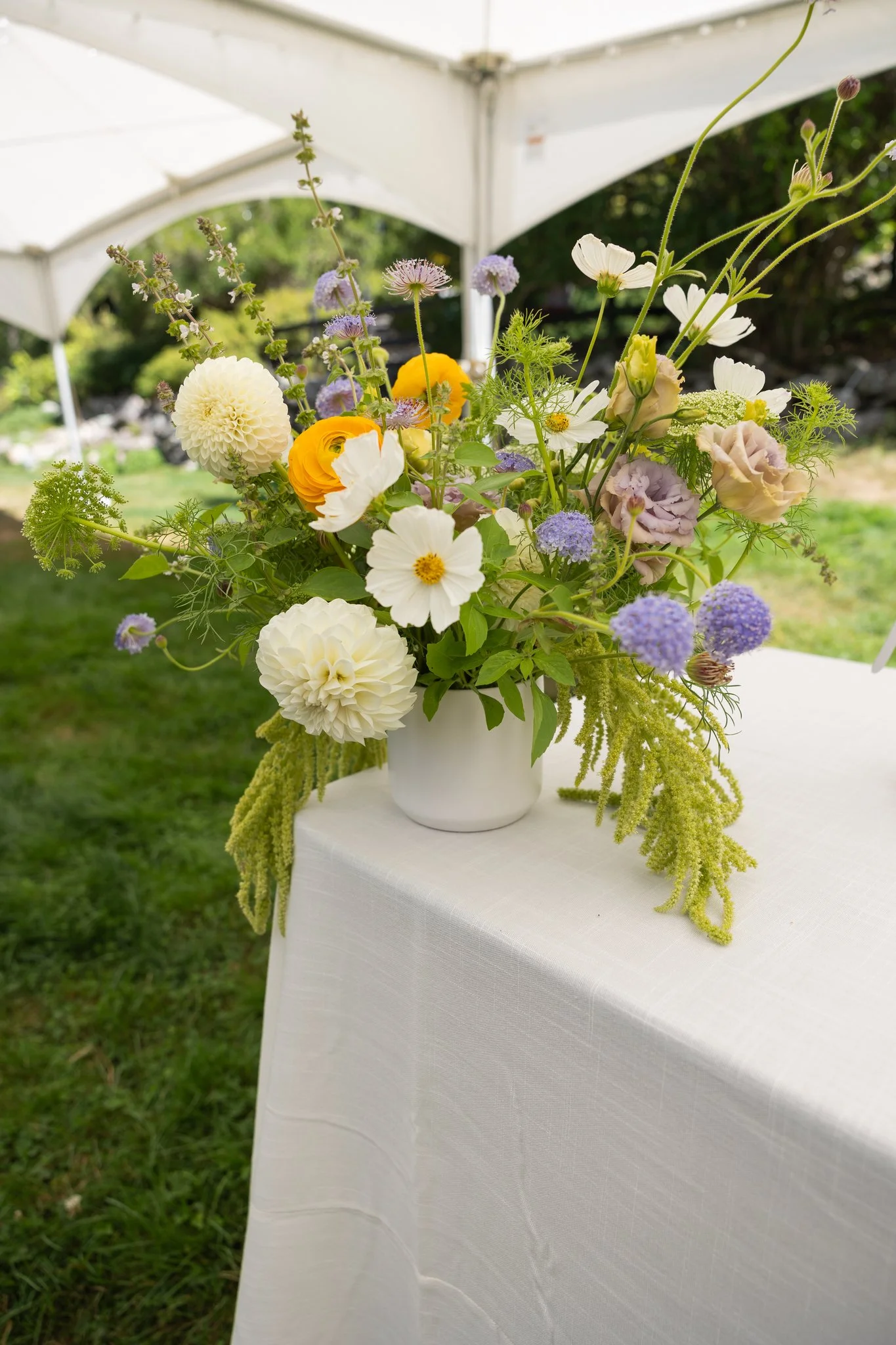 Lavender, white, lime green and gold wedding flower arrangement by Harpswell, Maine florist Celadon Floral