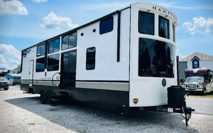 Looking for the perfect home away from home? We're excited to offer a 2024 Crossroads RV Hampton HP390PVL Luxury Destination Trailer - and it's in like-new condition!

This beautiful destination trailer is available for $54,900, with flexible financi