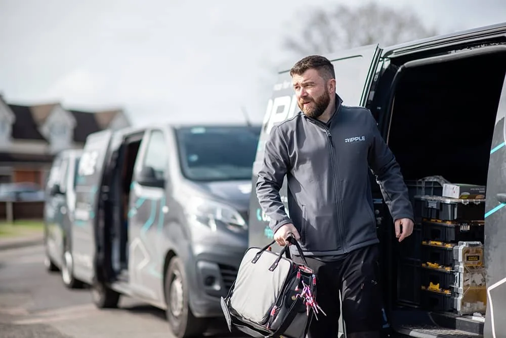 Electrical Engineer unloading van at company Ripple Electrical in Sevenoaks, Kent
