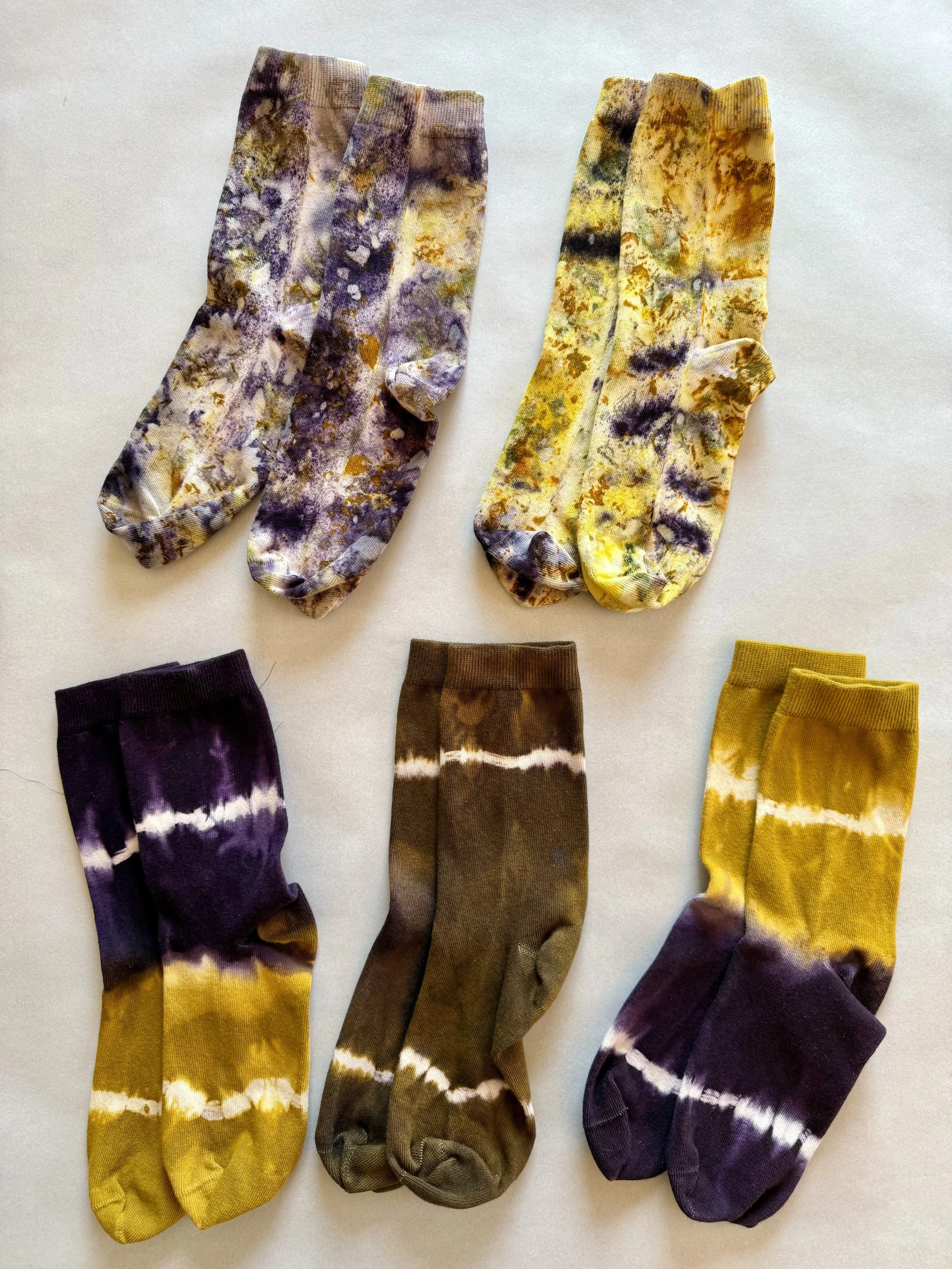 organic cotton socks dyed with technique variations using marigolds and logwood
