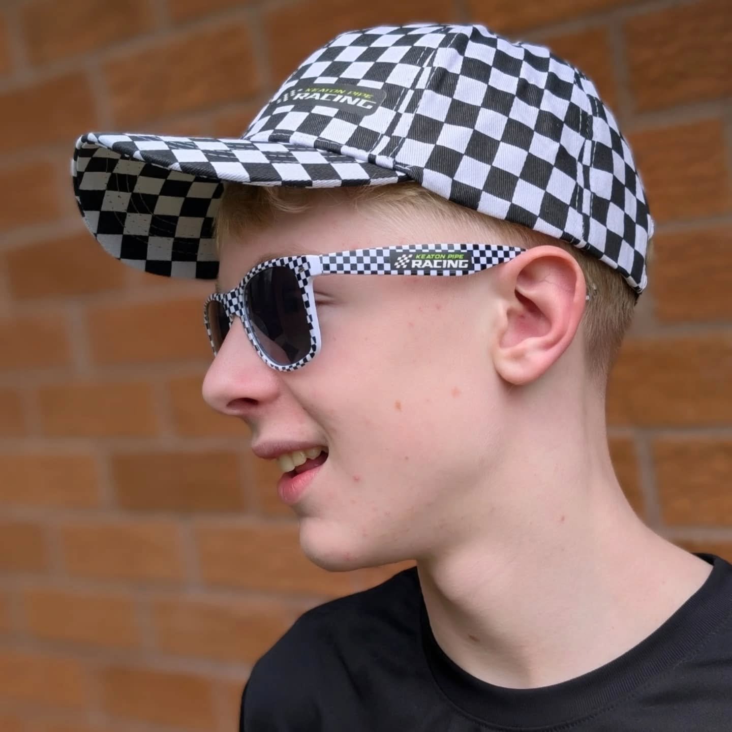 Had a lot of fun planning my merch this season! Last year we had a great response to the checkered flag patterned bucket hats so we are back with the pattern again but on baseball hats and sunglasses! The hats are adjustable, we have mostly kids sung