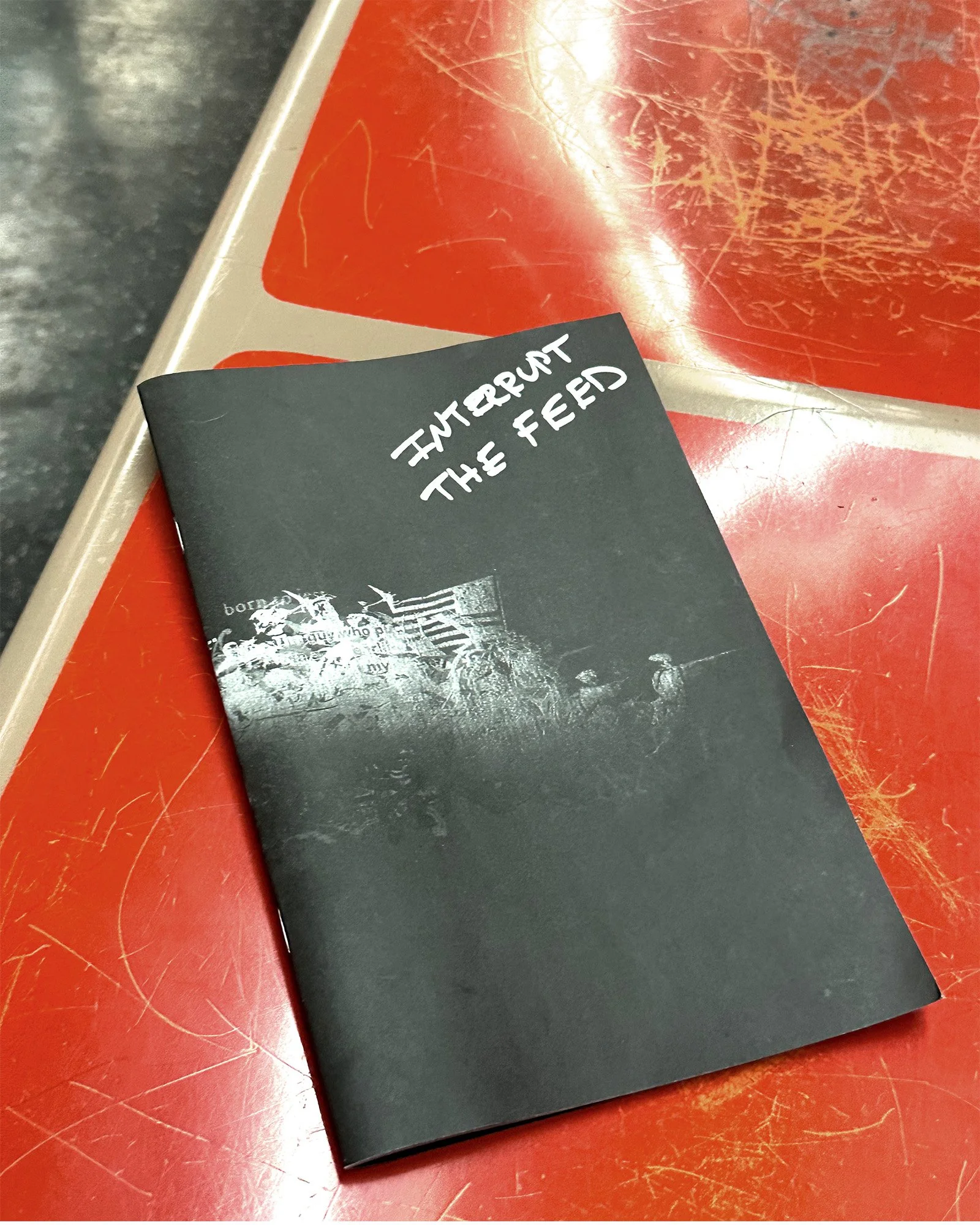 Cassandra Zampini’s MemeWarfare zine placed in a New York City public space this time the subway as part of its distribution.