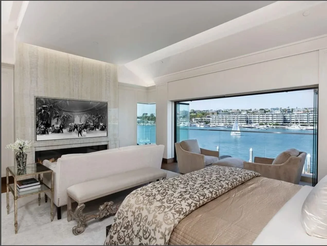 Enjoy a movie from your private Master Bedroom. Personally, I’d be torn between watching the movie or watching the sailboats on the bay !