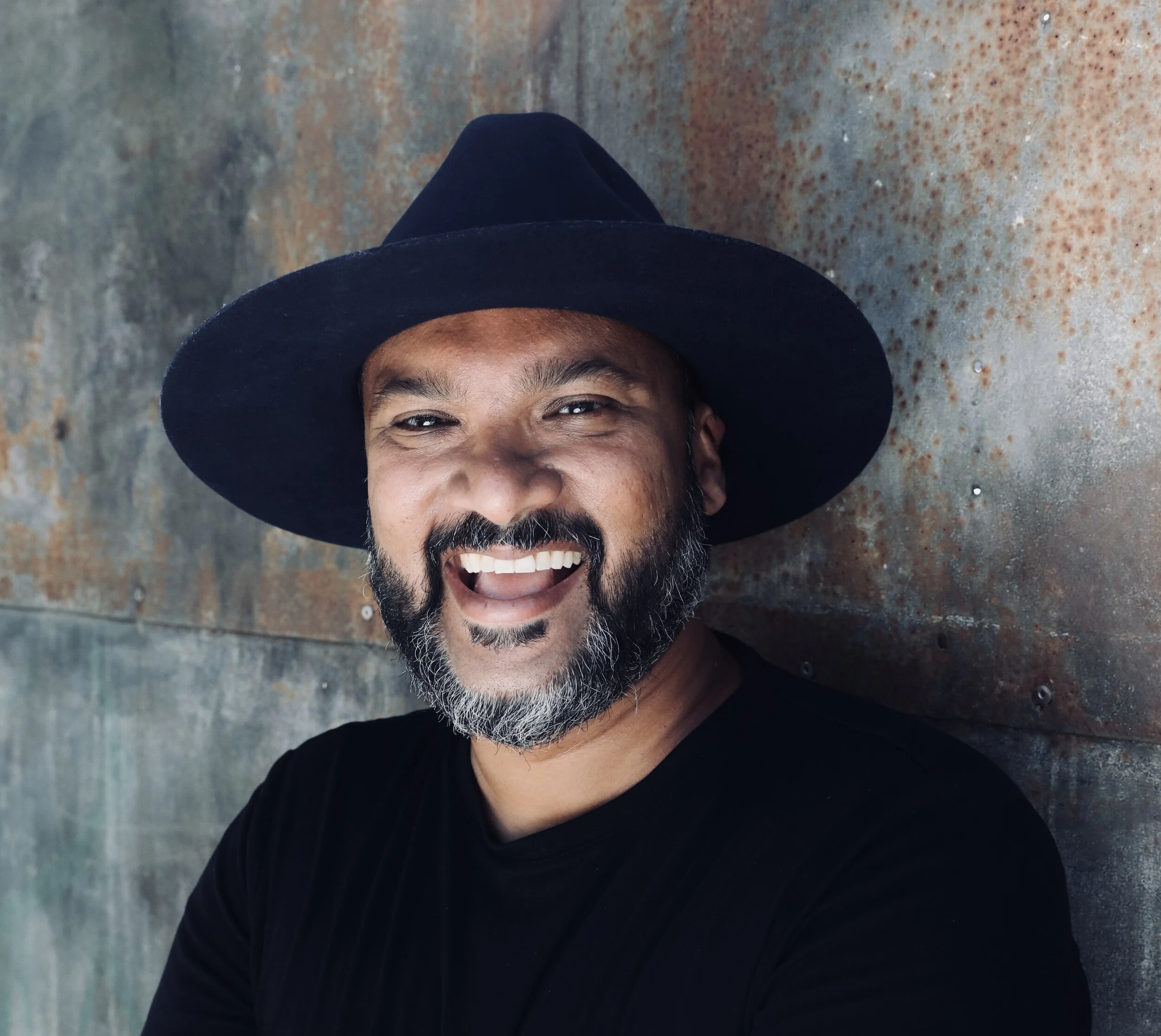 Afdhel Aziz Main Headshot Crop.jpg