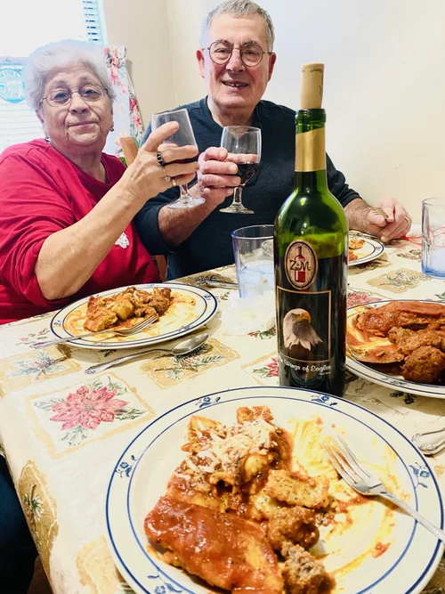 Gina's Family with wine and pasta
