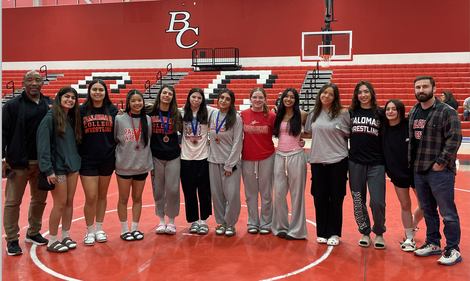 Palomar Women's Wrestling team in Bakersfield College Gym