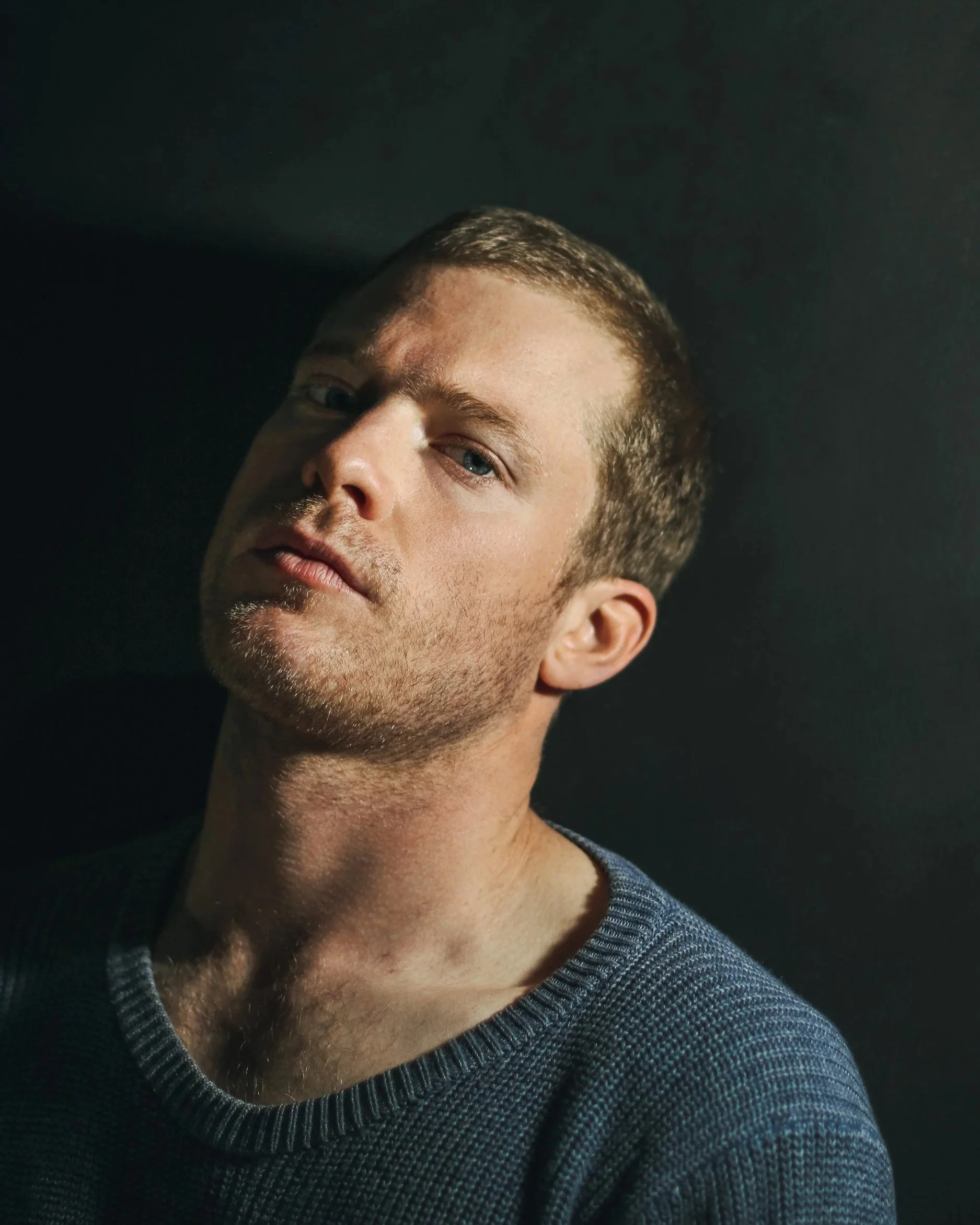 Studio portrait of actor Sam Reid photographed by Rebecca Hitch