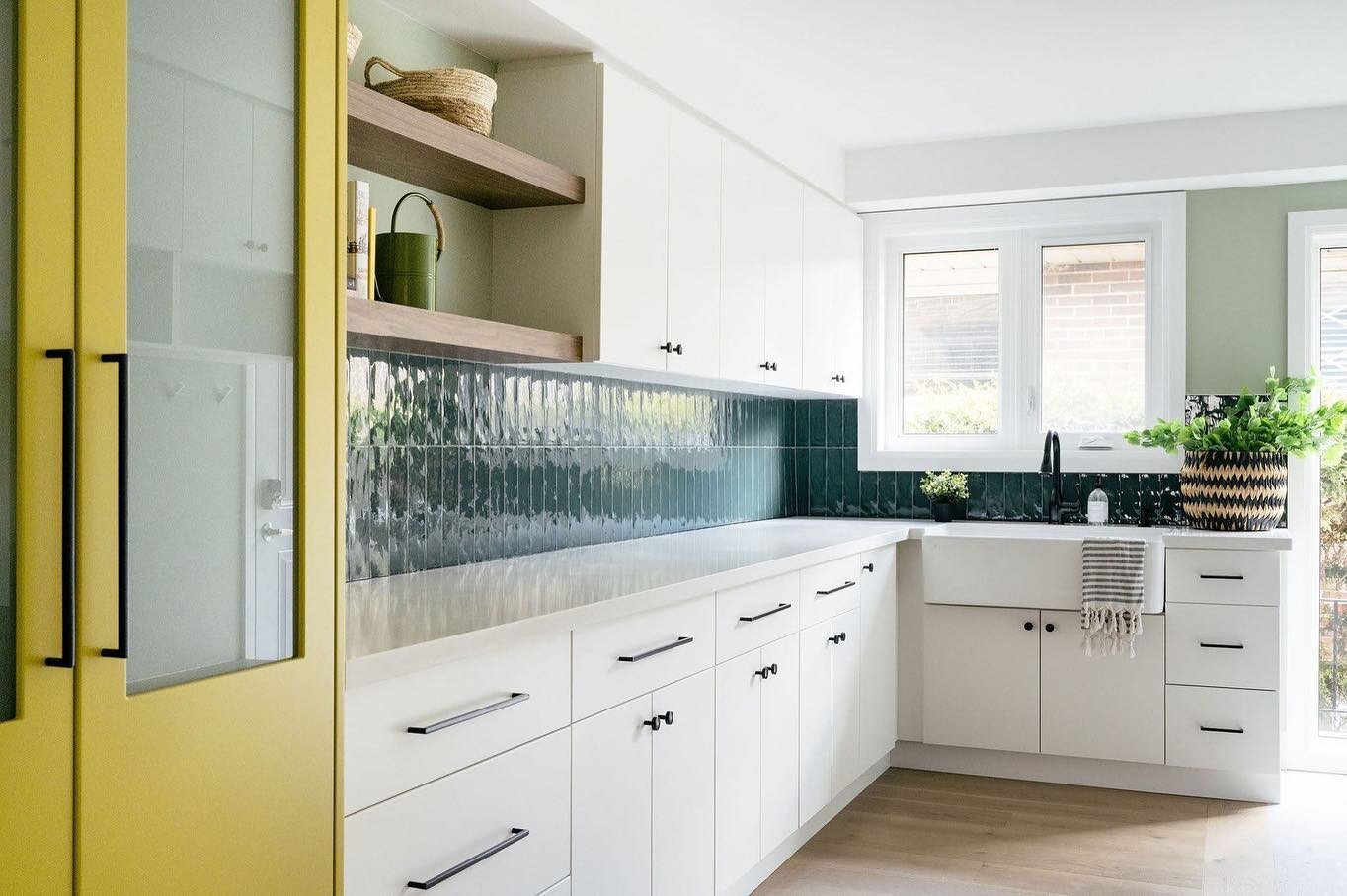 Swipe ⬅️ to see how this old kitchen was turned into a multifunctional mudroom, home office, and pantry!

📸 @janetkwan 

#myhomeinspo #colorfulkitchen #mudroomdesign #pantrygoals #houseandhome