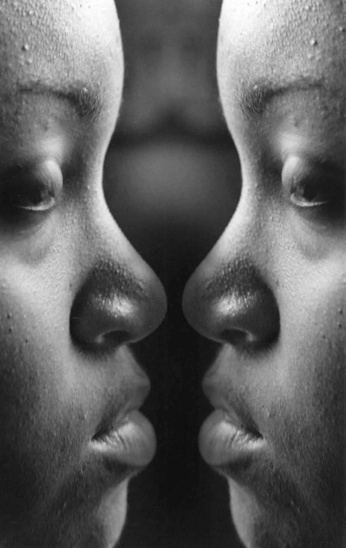 Double exposure of film negative on photographic paper.  Click here to see more photography.