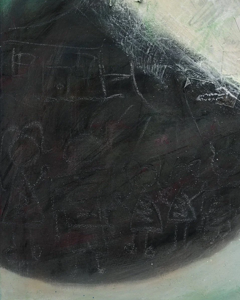A close up detail photo of “Becoming Memories” artwork. A black chalkboard with child-like doodles of houses, cars, and children drawn in white chalk.
