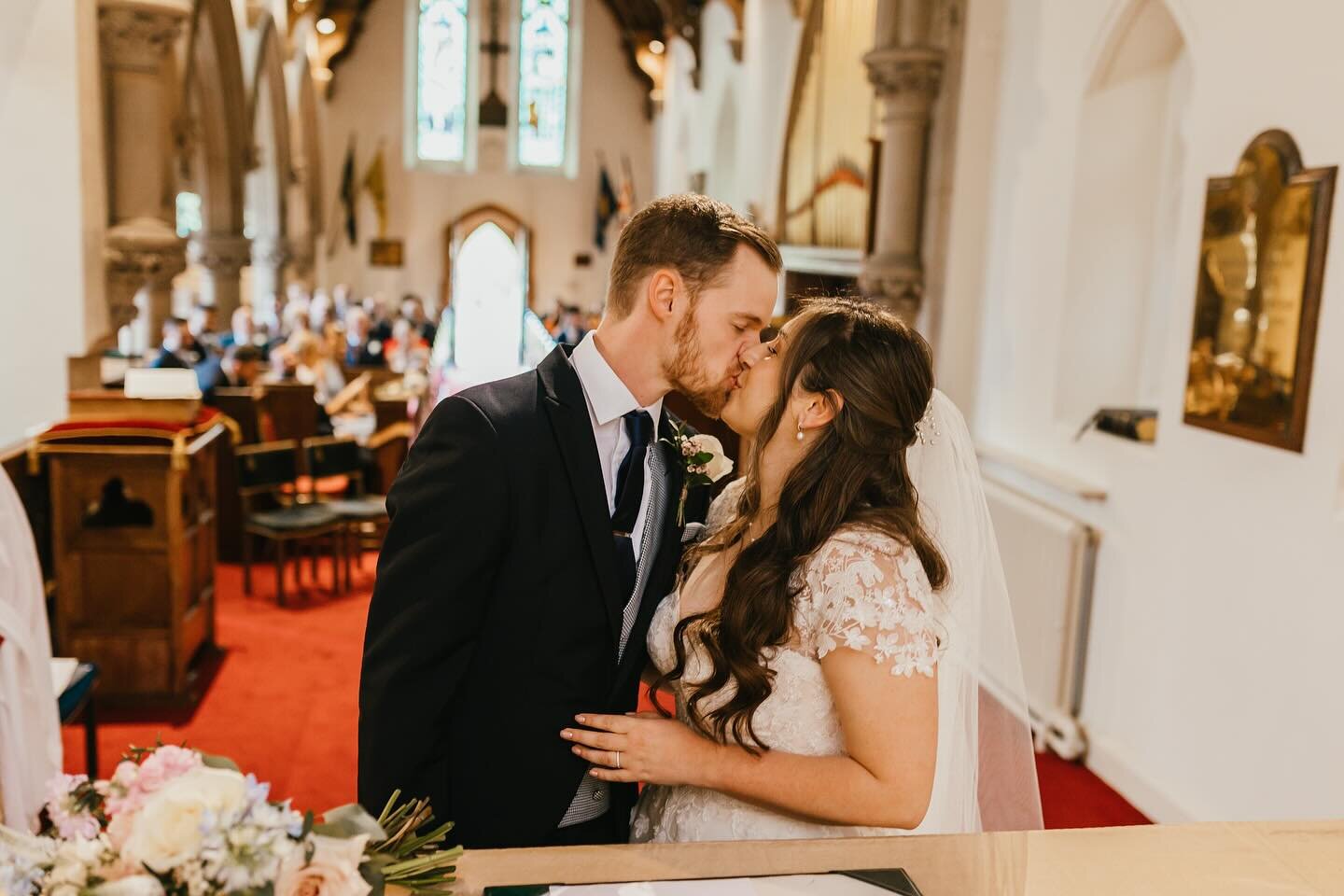 Take Time
When it comes to your kisses, try to hold them a bit longer than usual. Not only does this give me your photographer the perfect opportunity to capture the moment, but it also adds a touch of romance for the videographer. Trust me, those li