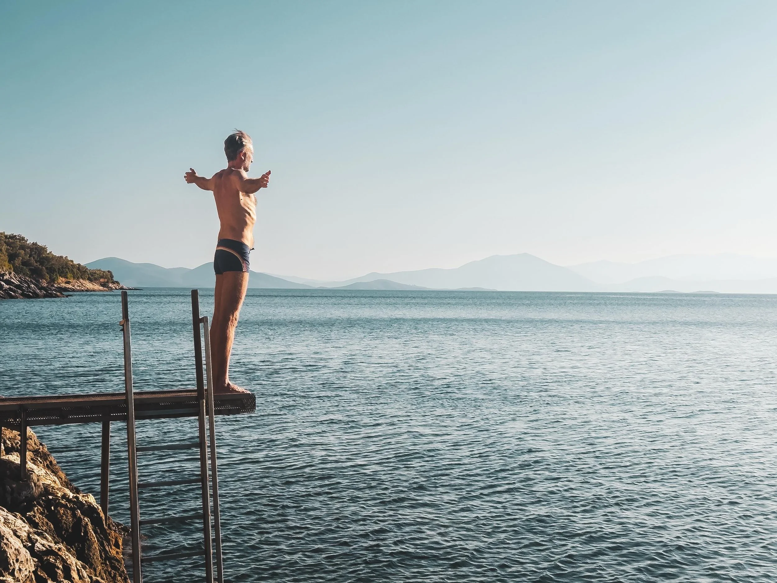 Dive to Thrive. 

I occasionally get asked where the name came from.
 
With any dive there is a great chance (especially for me) of failure - of hitting the water in an ungainly fashion, doing a belly flop or the trunks falling off. Sometimes all thr