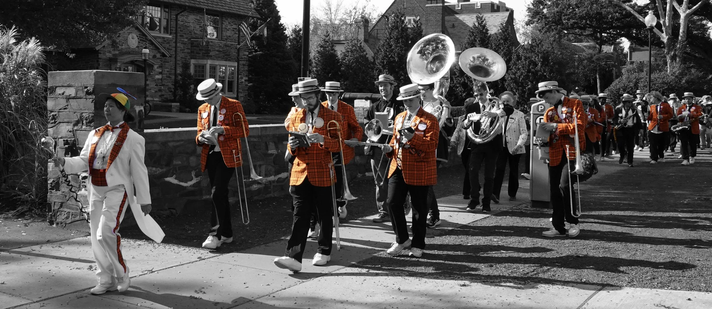  Here’s the university band heading over to the tailgate party that  our class (’56) gave before each home football game.  