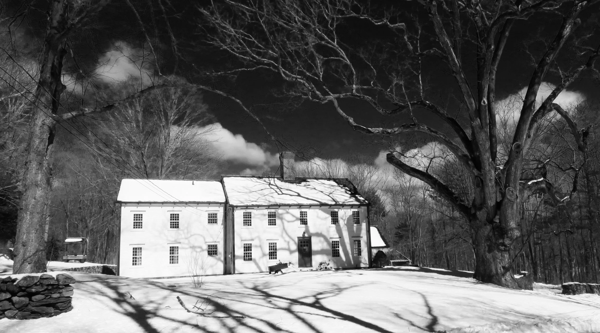  Here’s a compelling sight reminiscent of generations past, with the foreground shadows helpful to break up that all-white front lawn. 
