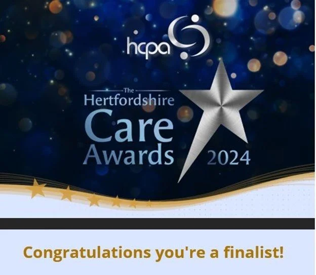 A digital graphic showing the logo for Hampshire County Council and the Hertfordshire Care Awards 2024, with celebratory stars and text indicating a finalist recognition.