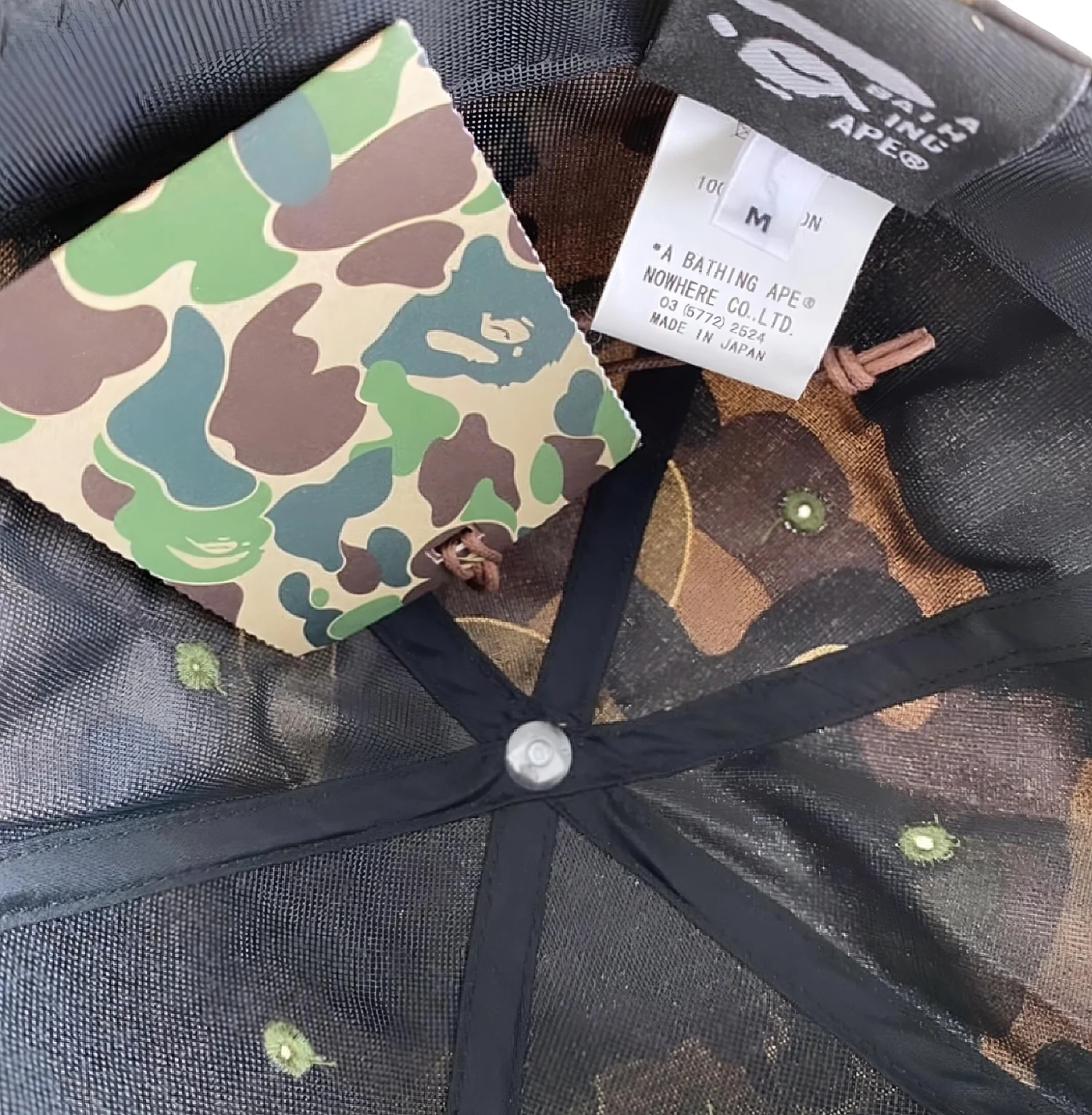 A BATHING APE X KAWS GREEN CAMO CAP — COLLECTIVE MILO
