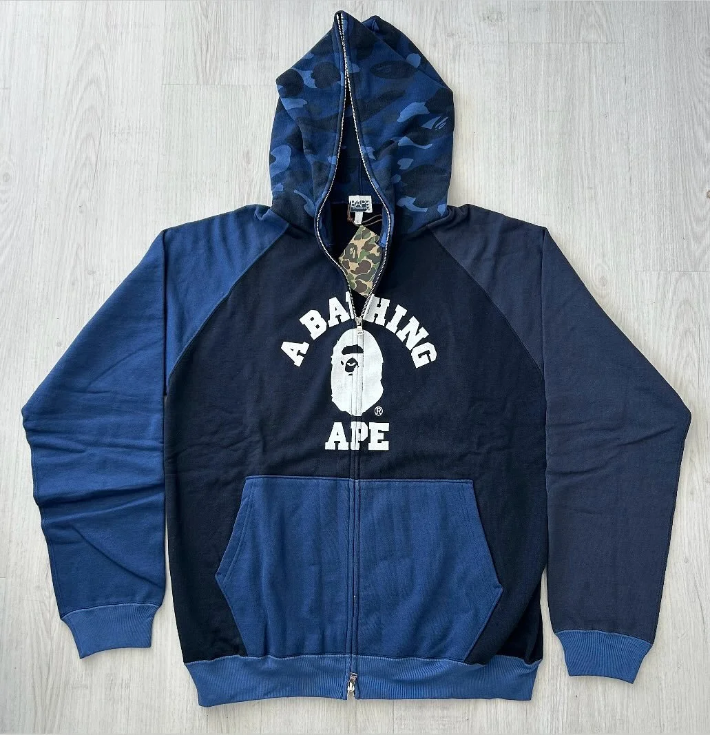 2006 A Bathing Ape &ldquo;Blue Camo/ College Logo&rdquo; Fullzip Hoodie

Available for purchase via

WWW.COLLECTIVEMILO.COM