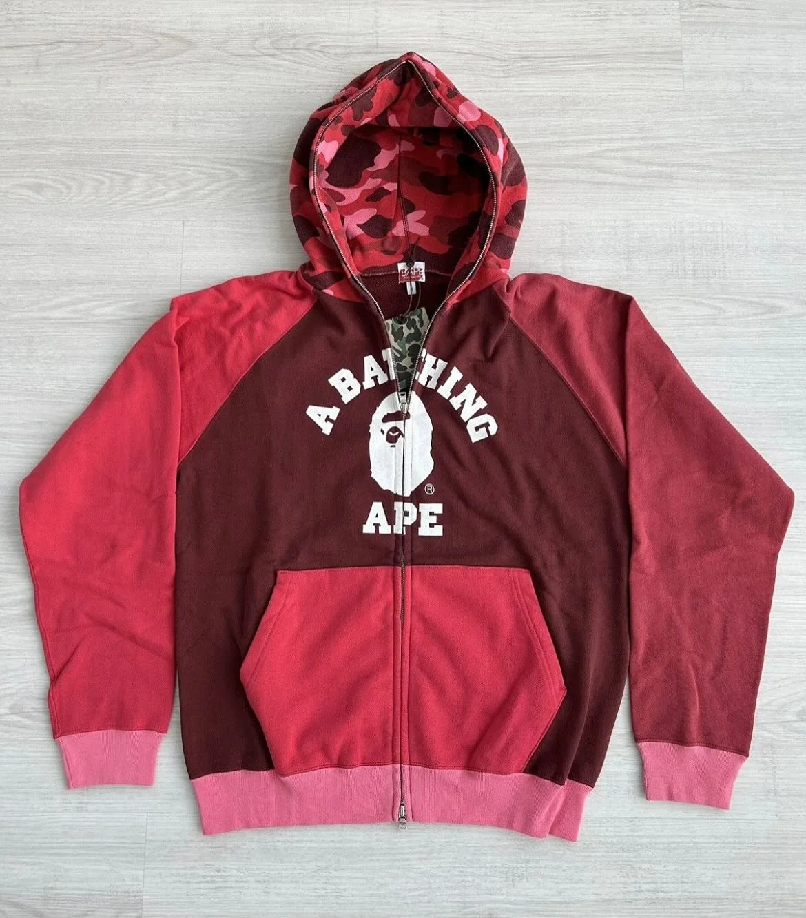2006 A Bathing Ape &ldquo;Red Camo/College Logo&rdquo; Fullzip Hoodie

Available for purchase via 

WWW.COLLECTIVEMILO.COM