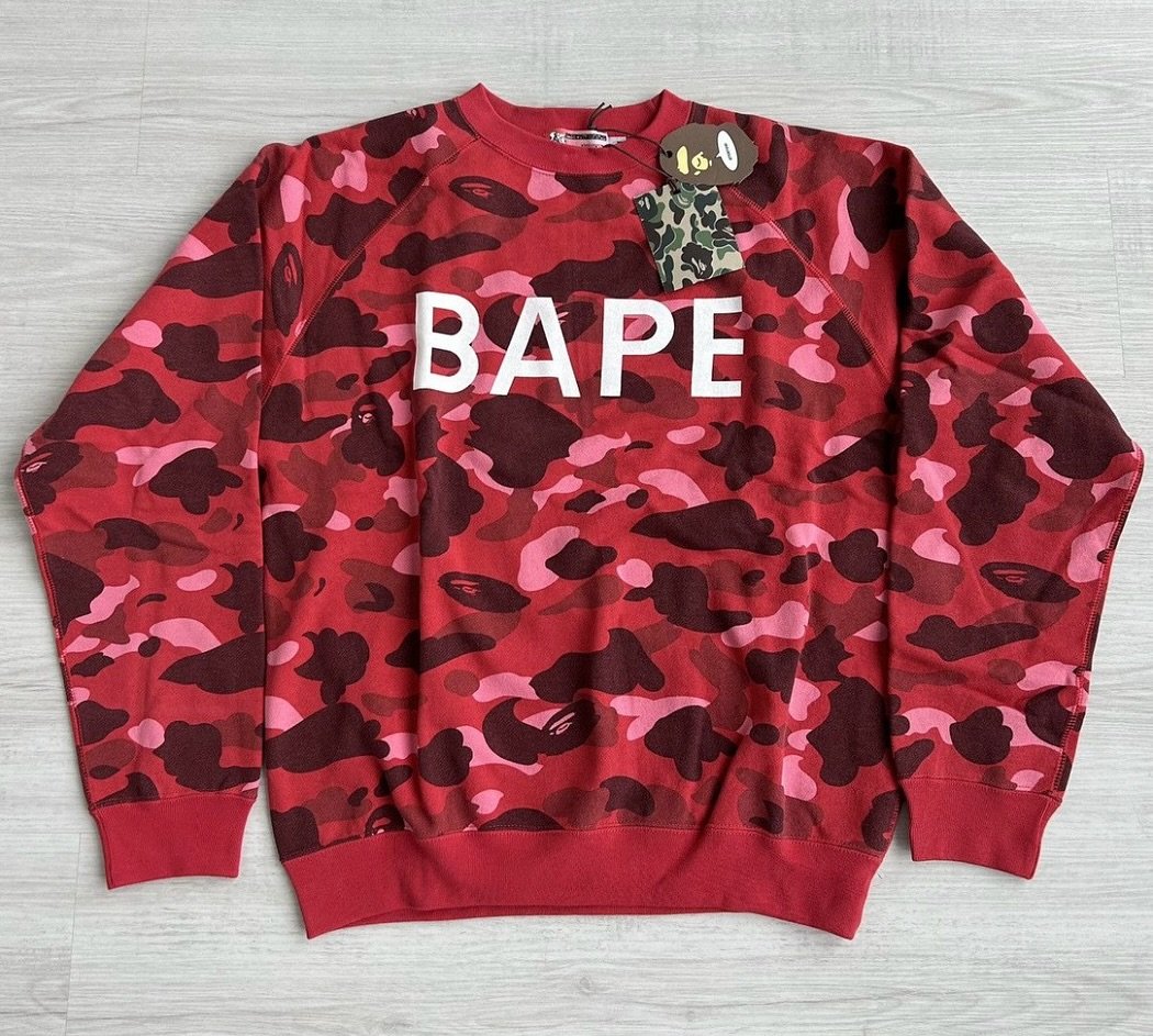 The &ldquo;N.E.R.D. Camo&rdquo; is a specific camouflage pattern tied to the early 2000&rsquo;s collaboration between A Bathing Ape and N.E.R.D., the band fronted by Pharrell Williams &amp; Chad Hugo. 

It&rsquo;s most recognizable in a red camo colo