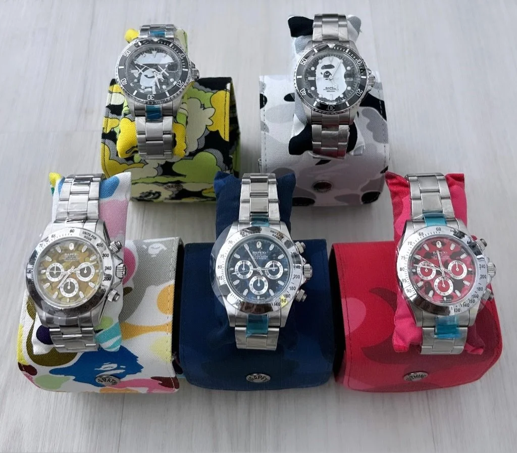 BAPEX is BAPE&rsquo;s in house watch line, styled after the classic Rolex sport models (most notably the Submariner for &ldquo;Type 1&rdquo; and the Explorer II/Daytona cues for later variants). 

In 2005, BAPE released multiple BAPEX Type 1 pieces, 