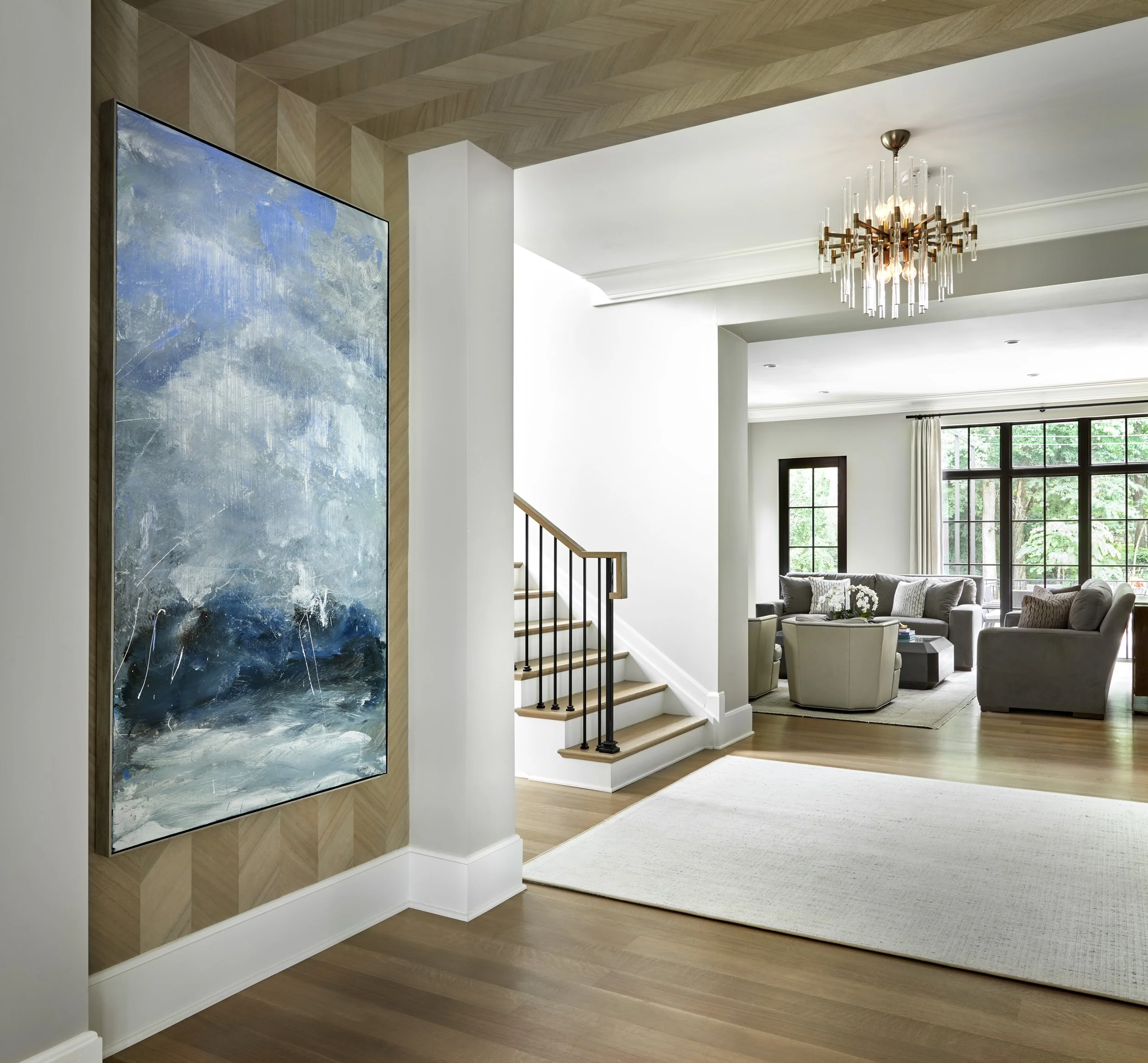 Open plan living space with layered neutrals and natural light