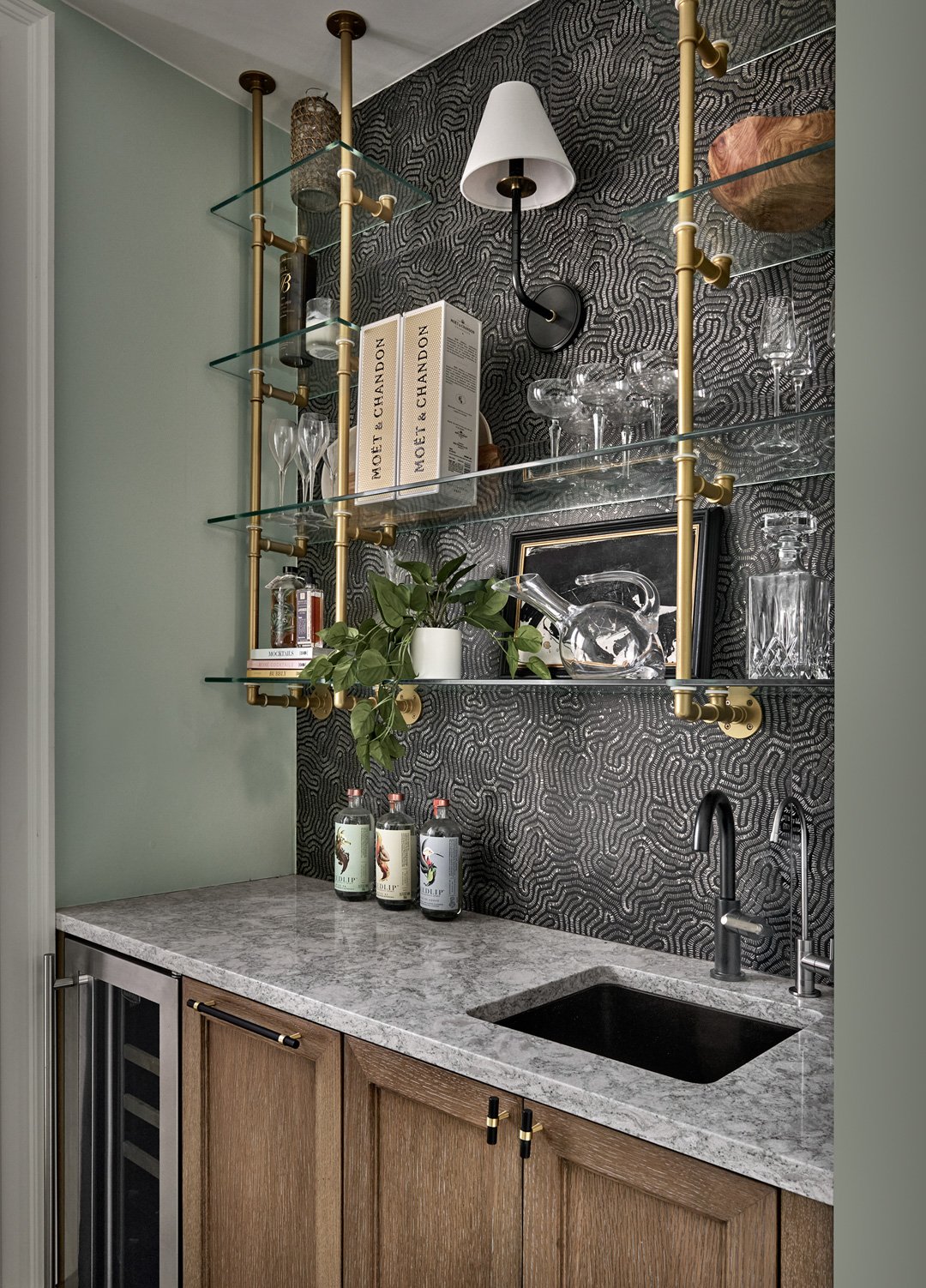 Bathroom with tiled surround and considered fixtures