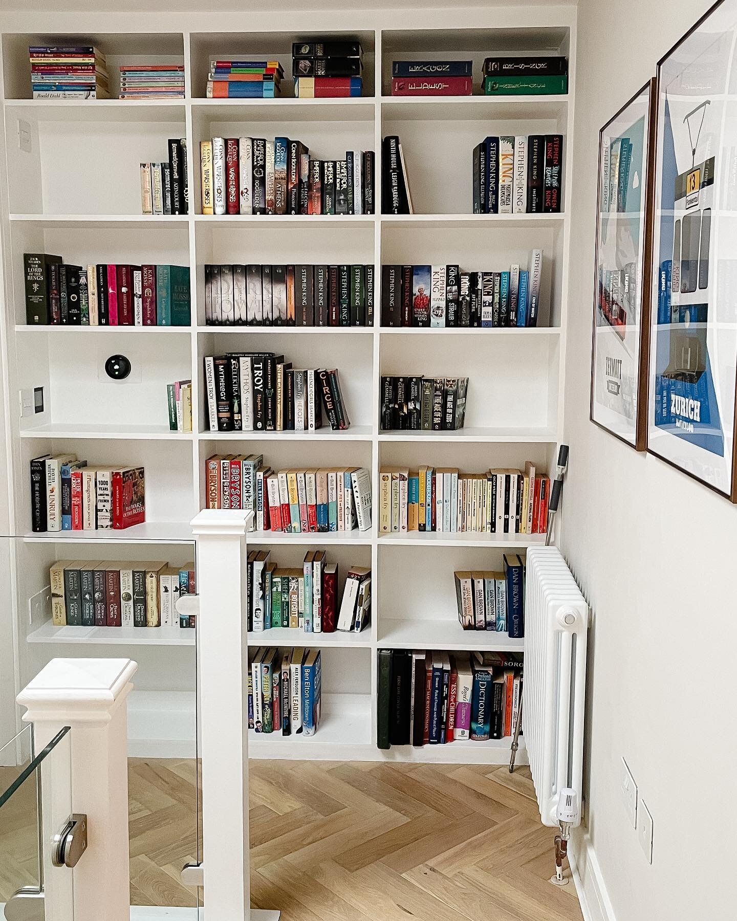 Here's the transformed staircase and landing from a recently completed project in West Dulwich. The client had a collection of New Yorkers from his time living in NYC, and a hell of a lot of books. 

We emphasised the double height staircase by creat